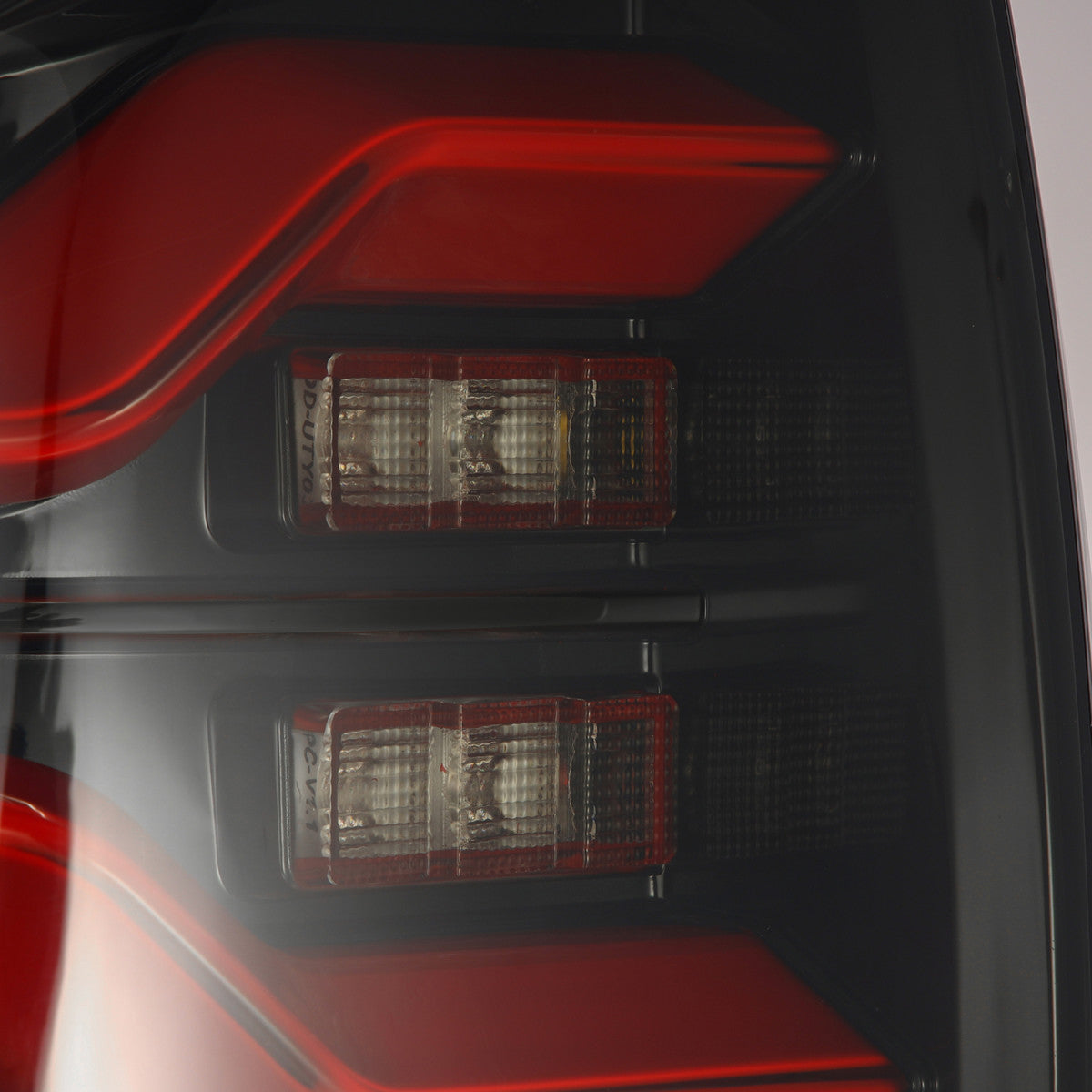 2016-2023 Toyota Tacoma AlphaRex LUXX Series LED Tail Lights - Black & Red Smoke Lens - High Performance Brake Lights for Off-Road & Night Driving