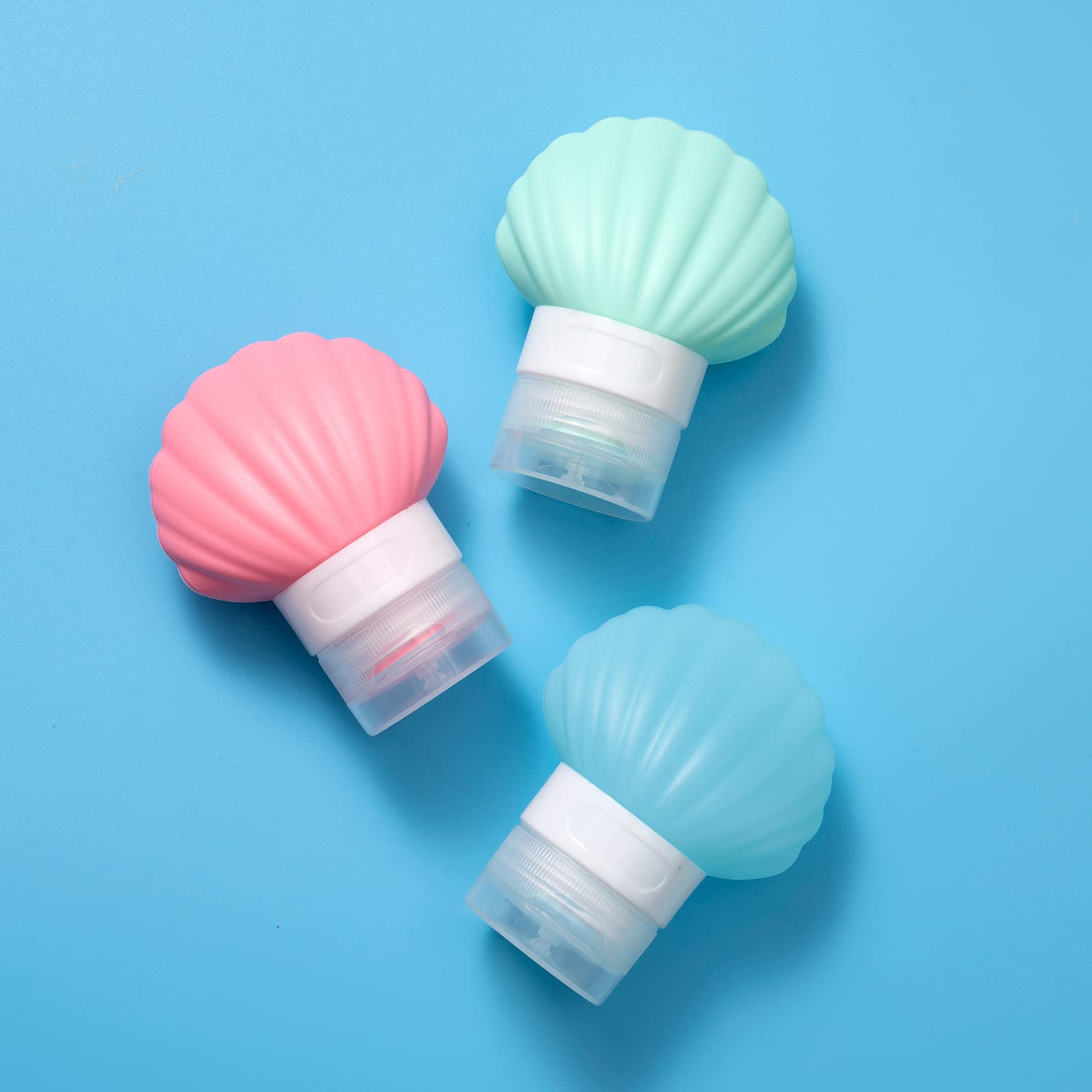 Leak Proof Squeezable Silicone Travel Bottles Set of 3 (1.35oz/40ml) - Reusable Refillable TSA Approved Toiletries Containers for Shampoo, Lotion & Cosmetics | Shell Shaped Eco-Friendly Design for Air Travel, Gym & Vacation Essentials
