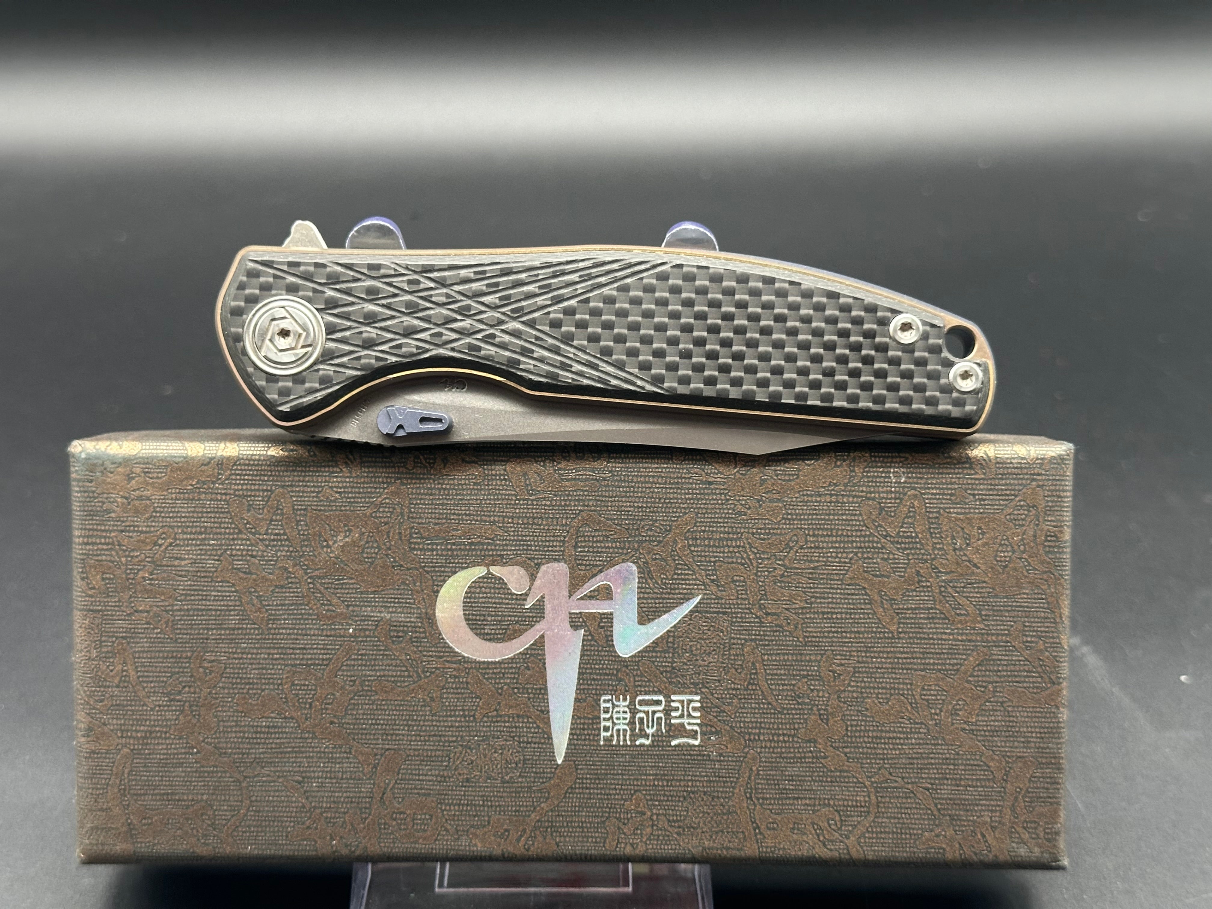CH Knives CH3516 Bronze Titanium Frame Lock Folding Knife with Carbon Fiber Scales & Blue Accents - EDC, Outdoor, Camping, Survival Gear