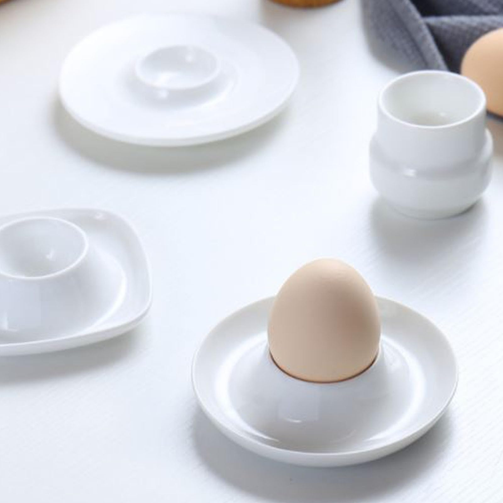 4 Pack White Porcelain Egg Cups for Soft Boiled Eggs - Easy Clean Egg Holder for Breakfast, Dinner & Kitchen Use - Perfect for Easter, Brunch or Snack Time