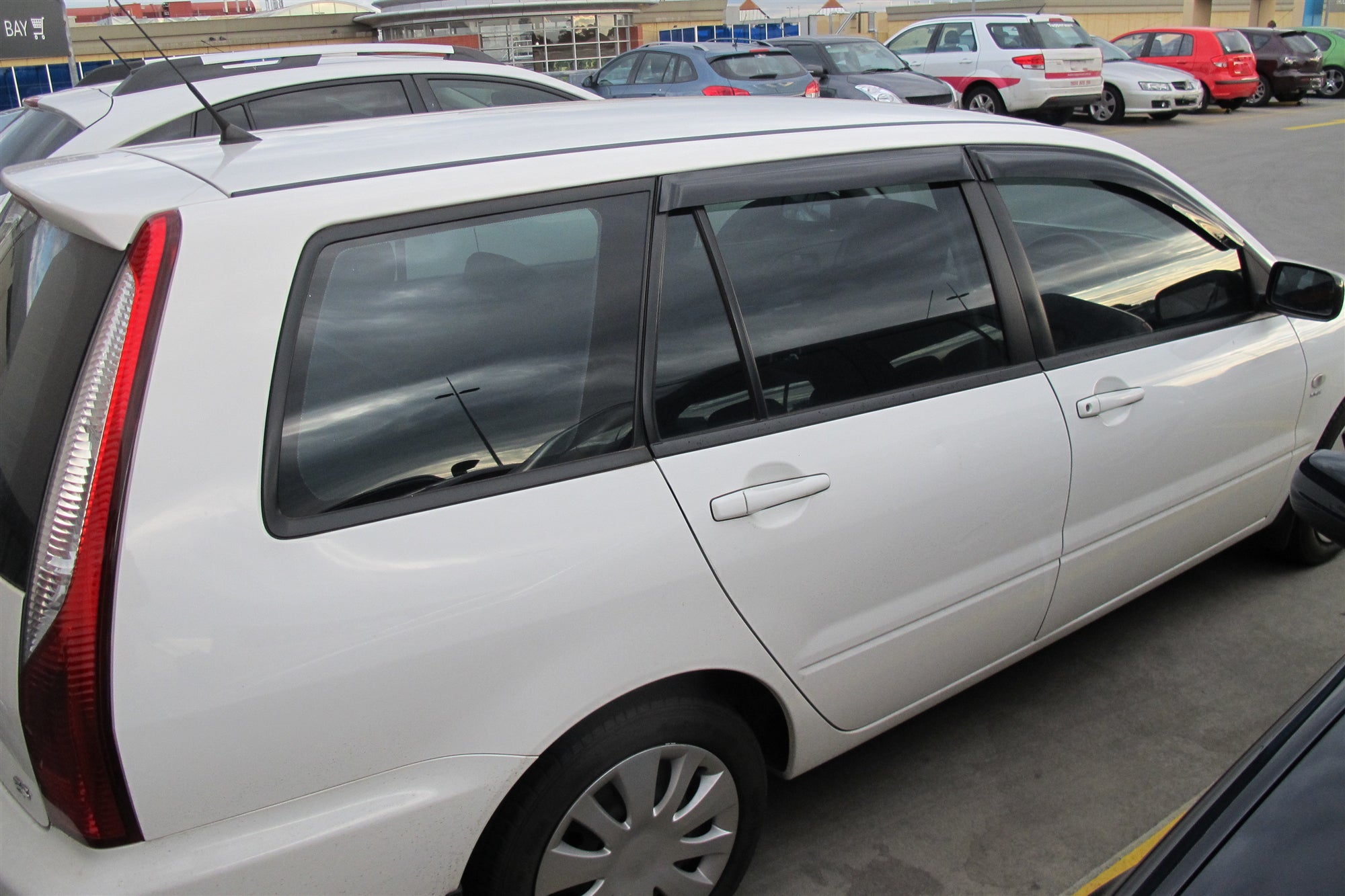 2003-2007 Mitsubishi Lancer Wagon Weather Shields - Car Window Rain Guards & Wind Deflectors for All-Weather Protection - Perfect for Rainy Days & Highway Driving