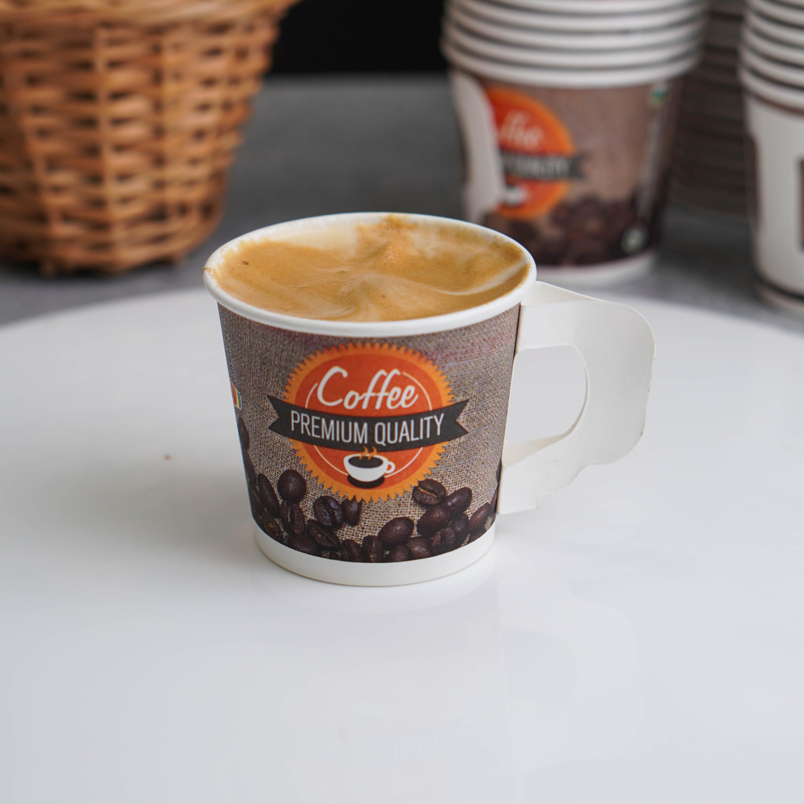 PARICOTT - 100 Pack Disposable Coffee Cups 150ml, Printed Paper Tea/Coffee Mugs, Eco-Friendly Recyclable Single-Use Drinkware for Office, Parties, Picnics & Catering Events - Multicolor Handle Cups