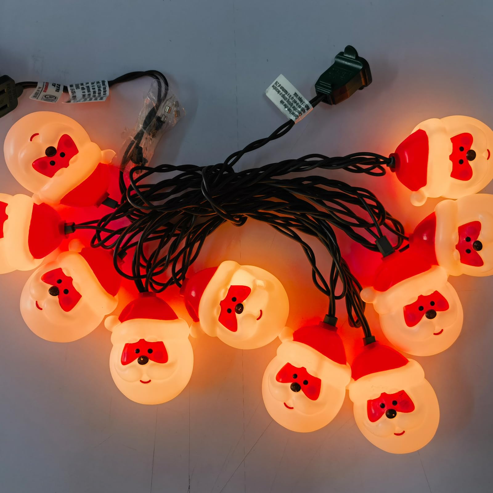 SUNSGNE 8.5FT Christmas Santa Claus String Lights - 10 Cute Cartoon Santa Head LED Lights with Green Wire, Connectable Indoor Holiday Decor for Home, Party, Xmas Tree, Fireplace & Window Decoration