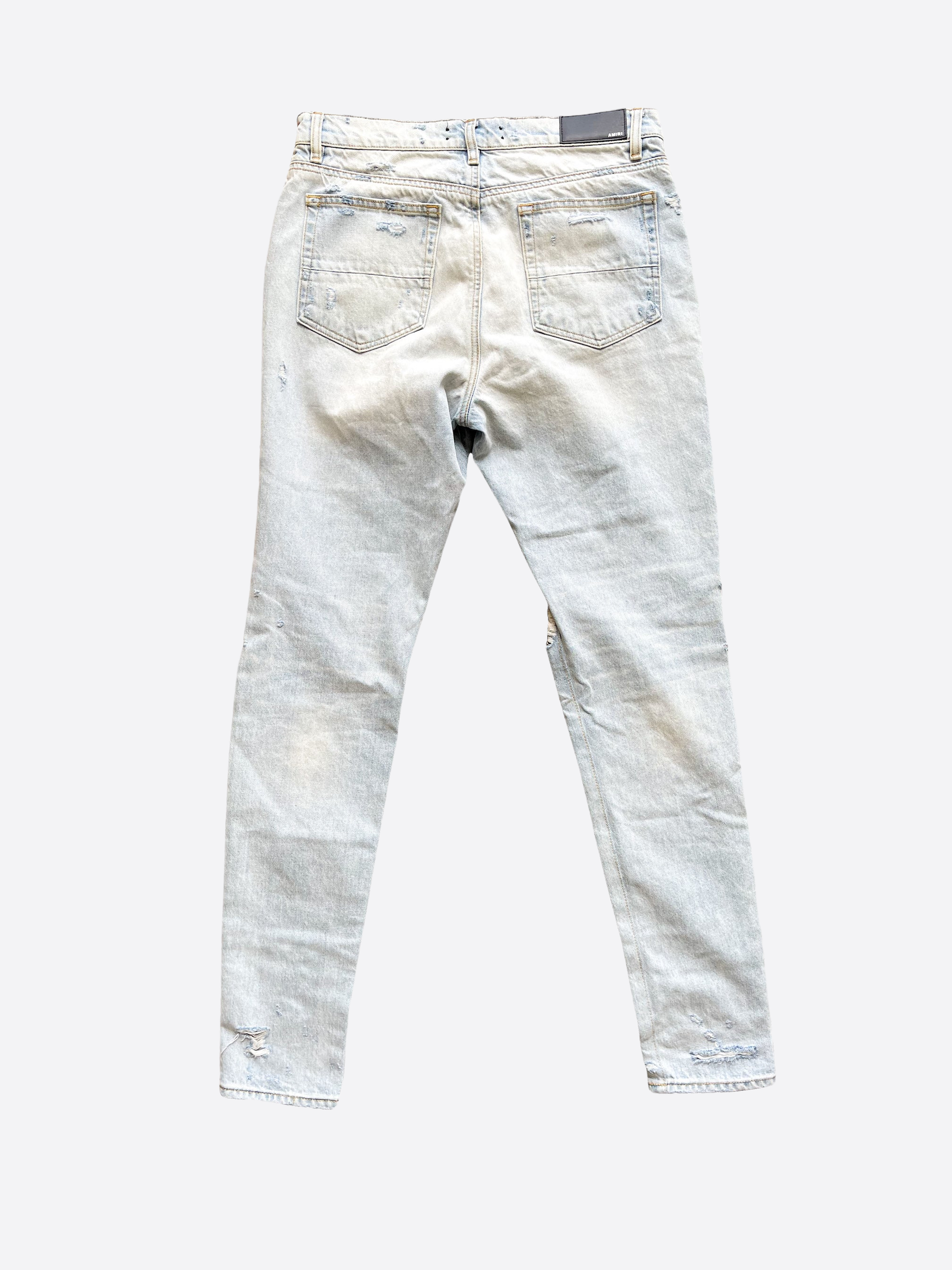Amiri Light Blue Distressed Jeans for Men - Vintage Washed Slim Fit Denim Pants | Perfect for Casual Wear, Street Style & Night Out
