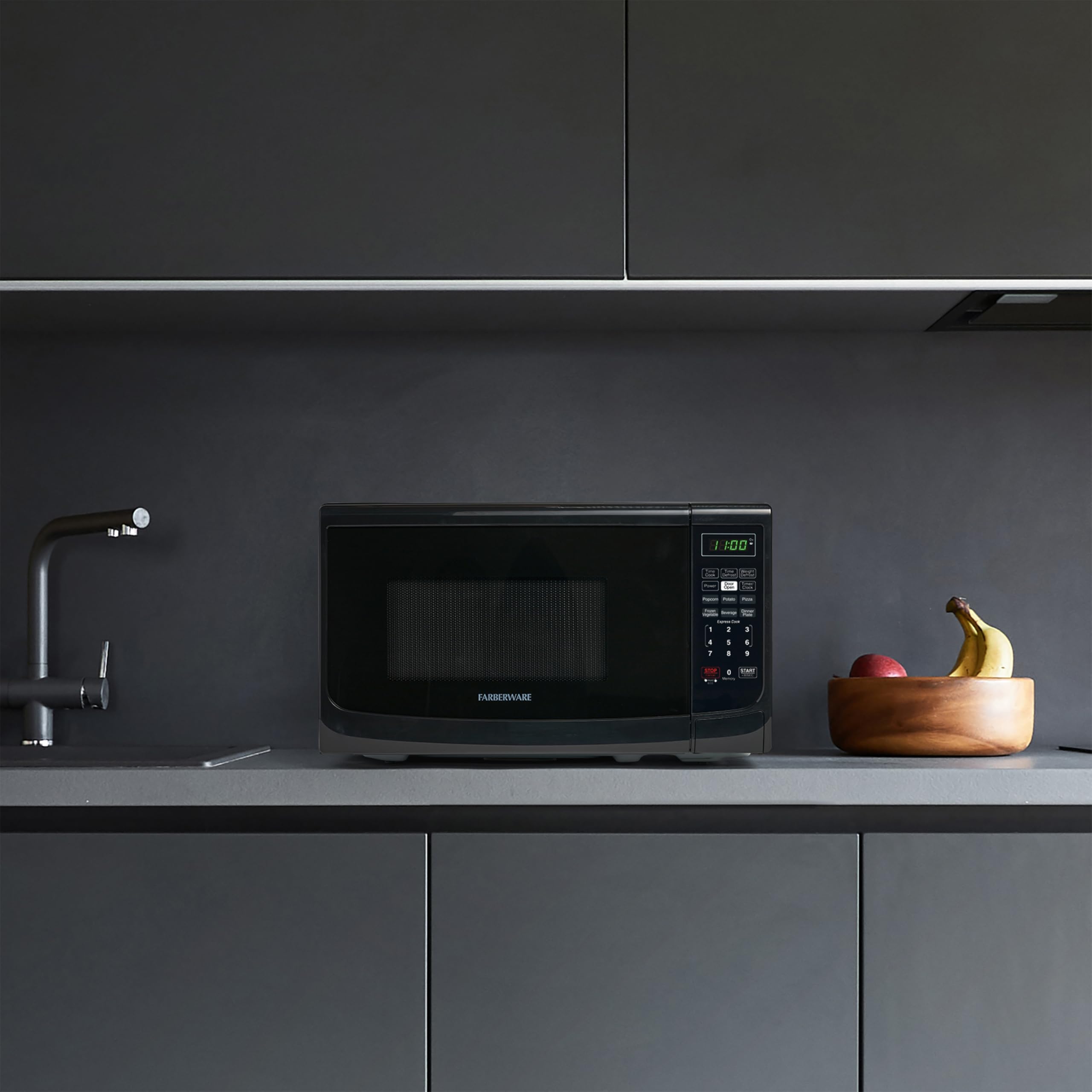 Farberware 0.7 Cu. Ft 700W Countertop Microwave Oven with LED Lighting & Child Lock - Easy Clean Grey Interior, Retro Black Design - Perfect for Small Kitchens, Apartments, Dorms & Office Break Rooms - Quick Meals, Reheating & Defrosting