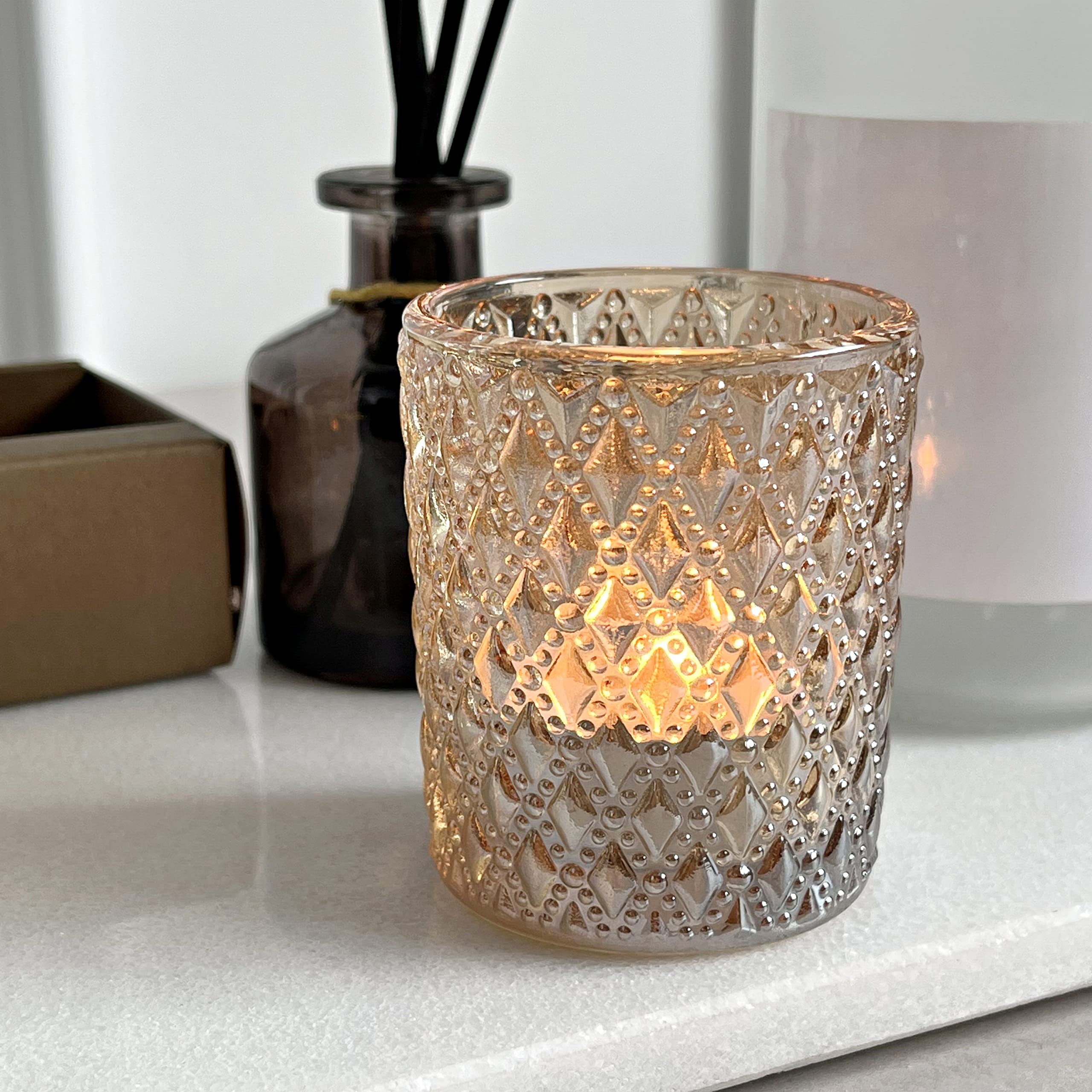 SHMILMH 12-Pack Champagne Gold Glass Votive Candle Holders - Elegant Tealight Candle Holders for Wedding Centerpieces, Birthday Party Decor, Halloween & Thanksgiving Table Settings - Perfect for Romantic Dinners, Spa Nights and Holiday Home Decor