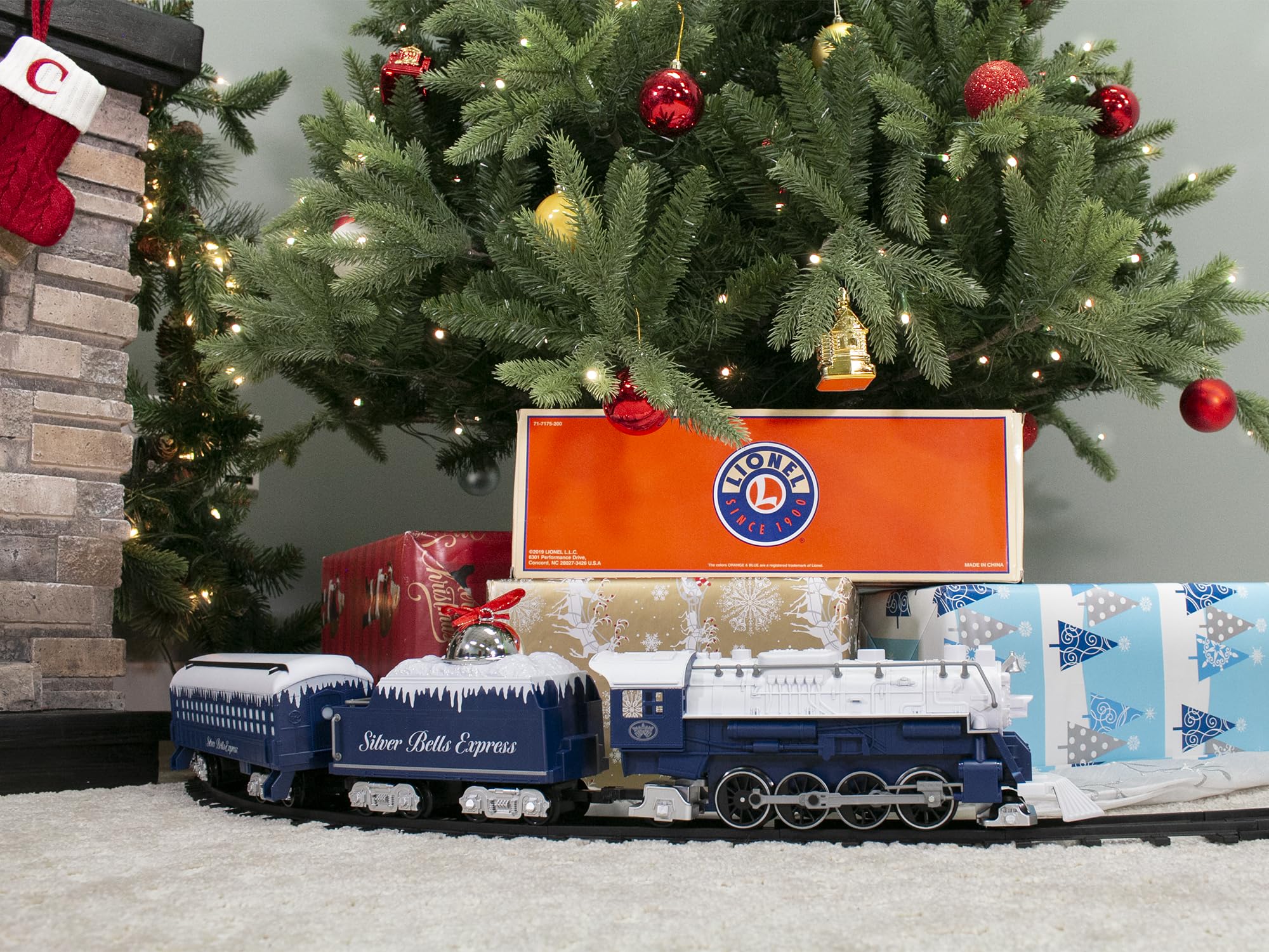 Lionel Battery-Powered Silver Bells Express Electric Train Set with Locomotive, 4 Train Cars, Oval Track & Remote Control - Realistic Train Sounds & LED Lights for Kids Ages 4+ | Christmas Decor, Holiday Display & Children's Educational Toy