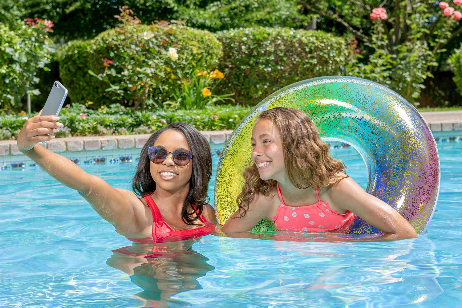 Poolmaster Rainbow Glitter Inflatable Swimming Pool Tube Float - Fun Summer Pool Party, Beach & Lake Floating Accessories for Adults & Kids