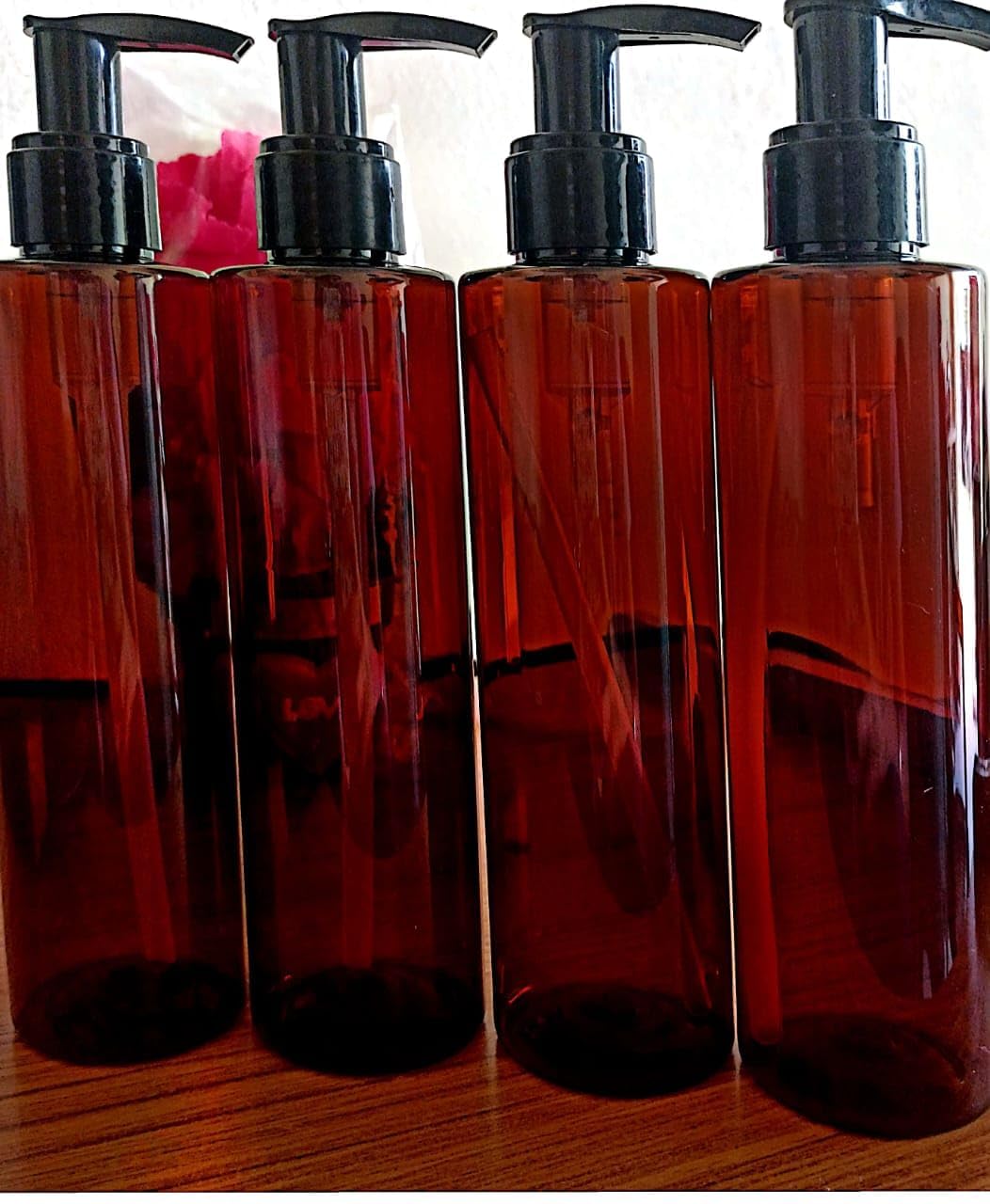 R K Bottles 200 Amber Secure Bottle with Black Pump Dispenser - 4 Pack Refillable Empty Bottles for Essential Oils, Lotions & DIY Beauty Products | Home, Salon & Travel Use