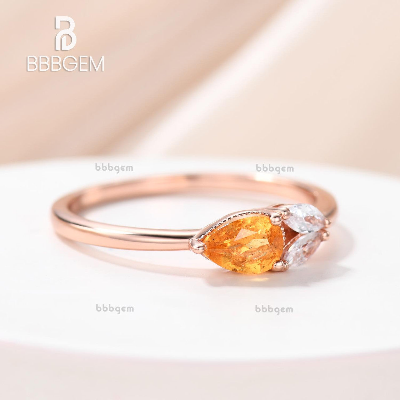 Exquisite East West Pear Shaped Spessartite Garnet Ring with Moissanite Accents - Basket Setting for Engagement, Anniversary & Special Occasions