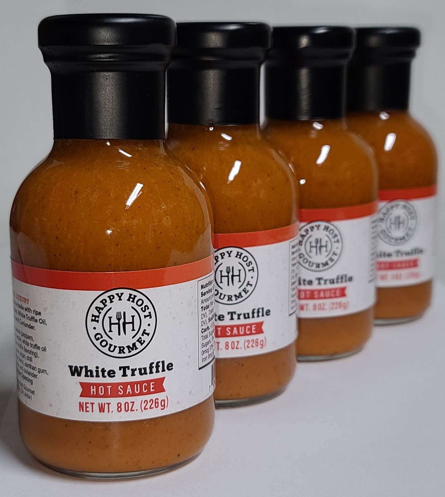 Happy Host Gourmet White Truffle Hot Sauce 4 Pack - Premium Spicy Sauce with Ripe Chili Peppers, Agave Nectar, White Truffle Oil, Cumin & Coriander - 25% Larger Bottle - Perfect for Tacos, Wings, Pizza & Gourmet Cooking