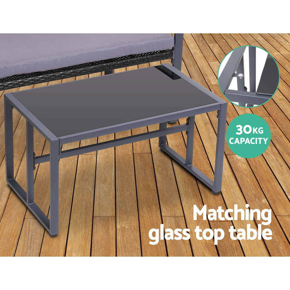 4-Piece Outdoor Rattan Sofa Set with Glass Top Table and Chairs - Black Patio Furniture for Garden, Poolside, and Backyard Relaxation