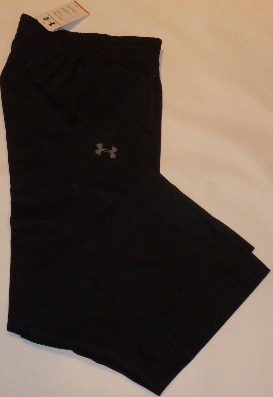 Under Armour Women's All-Season Black Workout Pants - Size 10 Small - Perfect for Gym, Yoga & Running