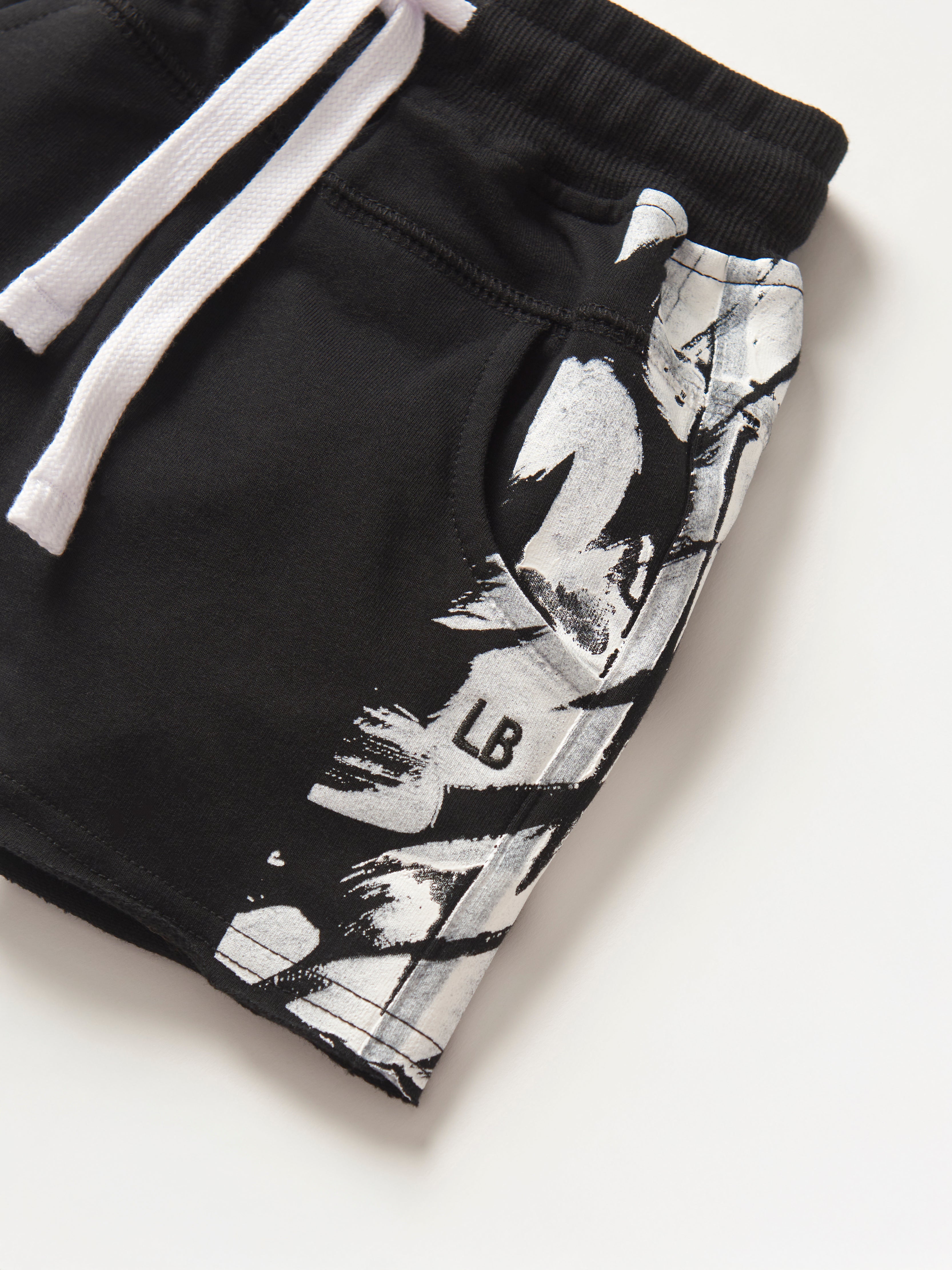 Imperfect Brush Stroke Raw Edge Harem Shorts - Black | Boho Chic Lounge Pants for Yoga, Beach & Casual Wear