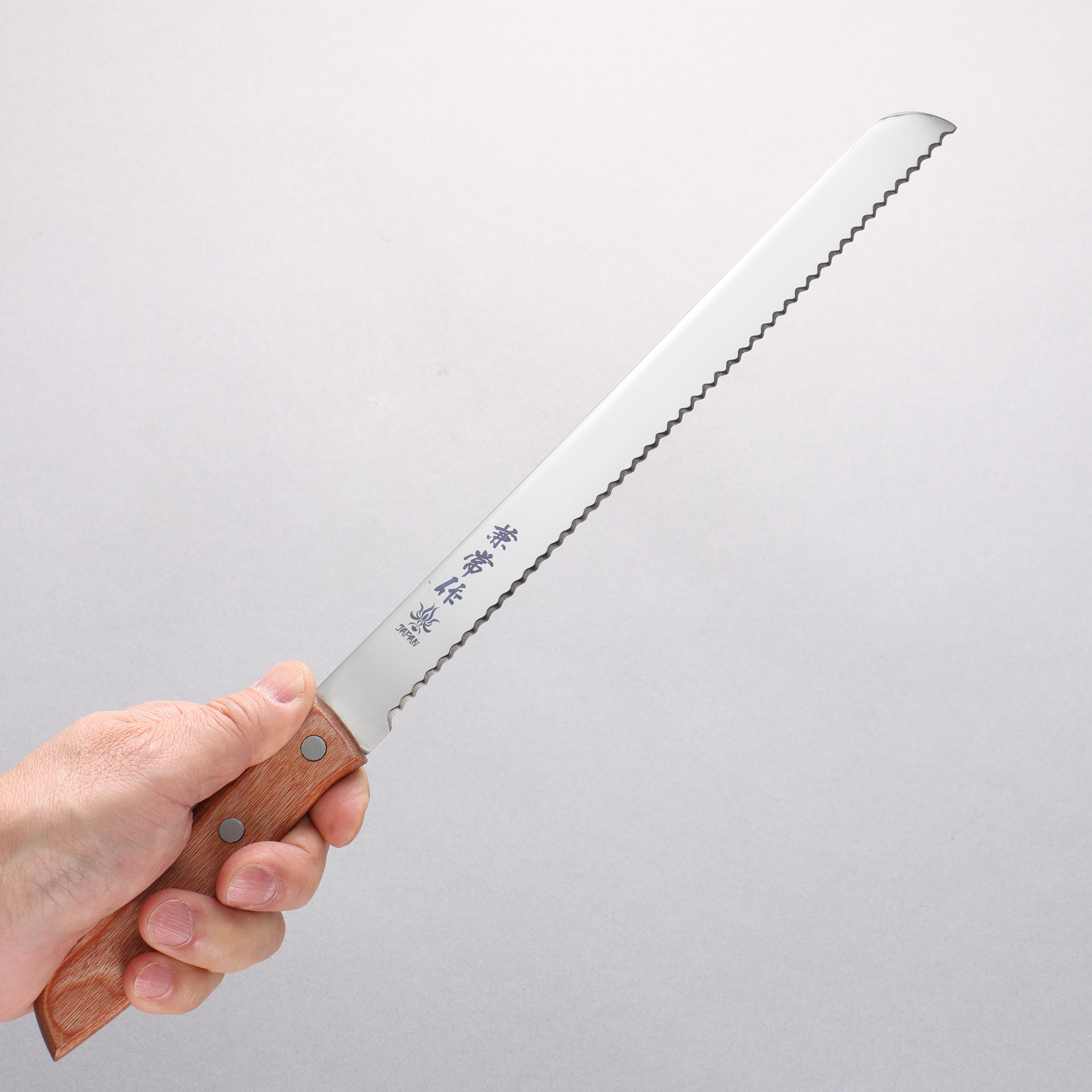 Kanetsune 555 Series DSR 1K6 Professional Bread Knife - 250mm Blade with Red Pakka Wood Handle - Perfect for Bakeries, Home Kitchens & Sourdough Bread Cutting
