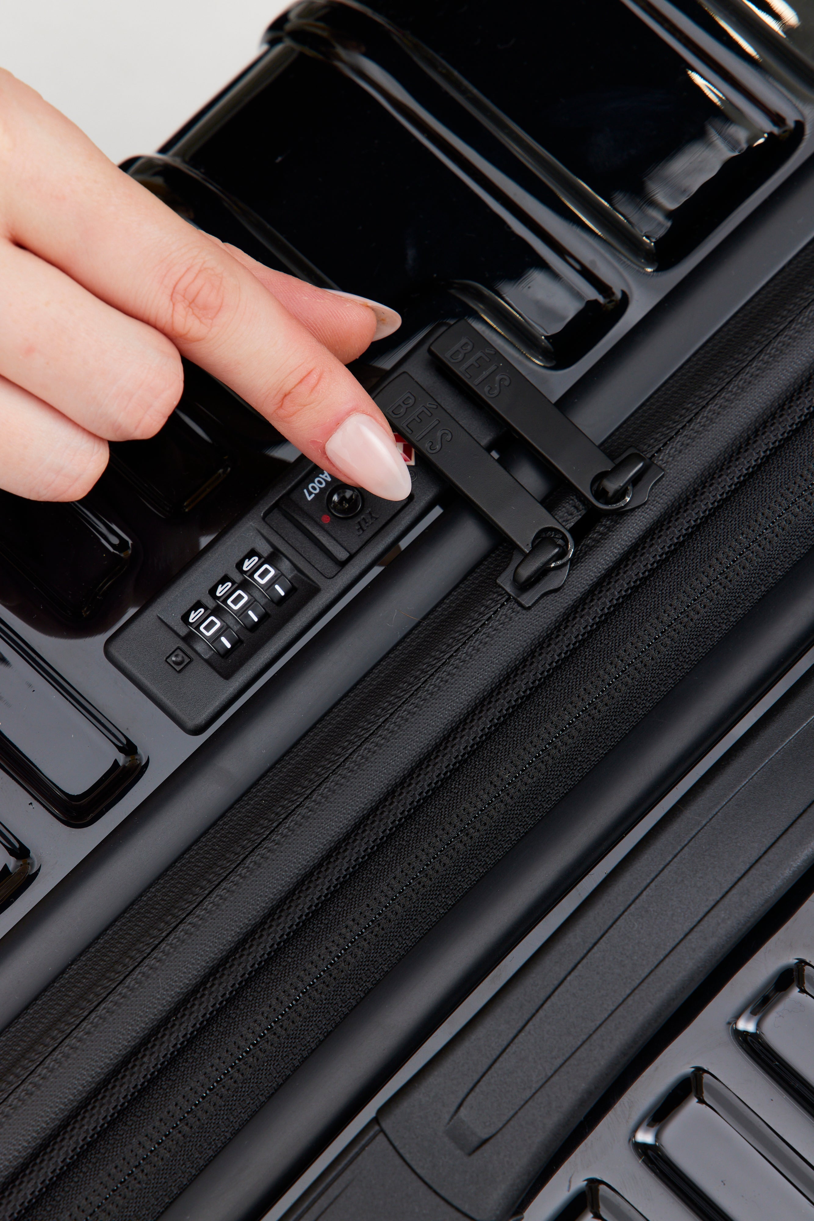 Glossy Black Carry On Roller Luggage - Perfect for Air Travel & Weekend Getaways