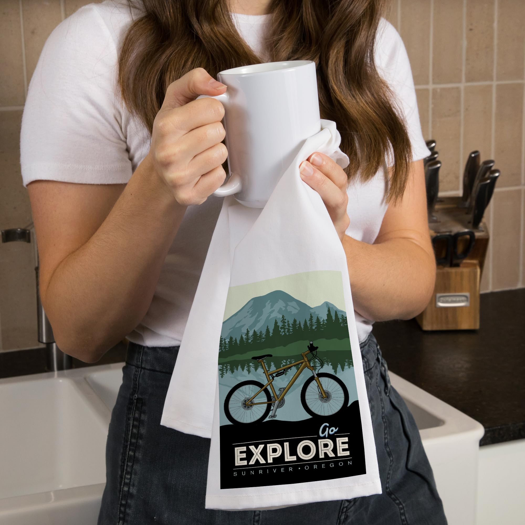 Lantern Press Sunriver Oregon Go Explore Bike 100% Cotton Tea Towel - Decorative Hand Towel for Kitchen & Home Decor - Perfect for Camping, Picnics & Outdoor Adventures