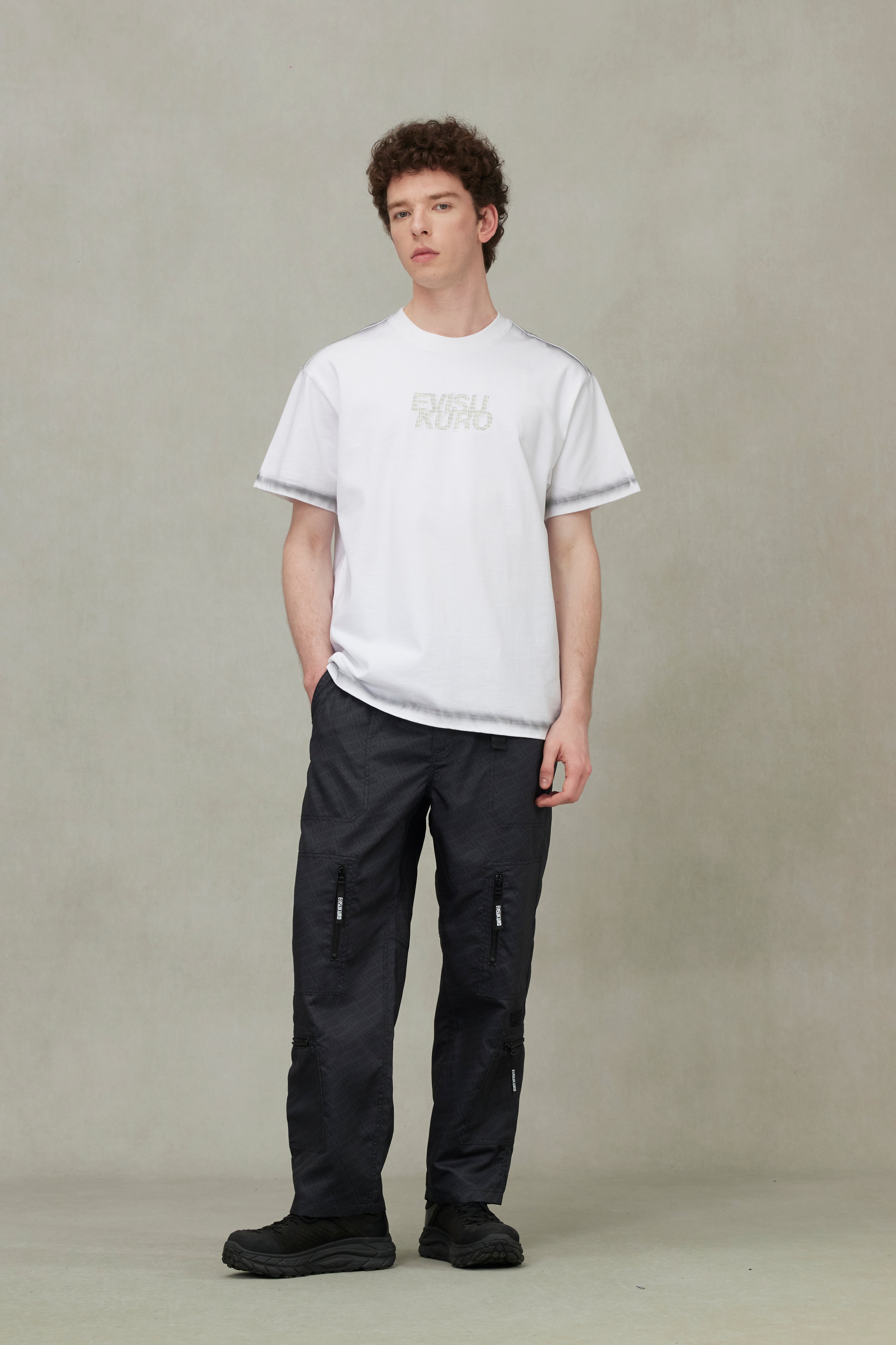 Trendy Allover Logo Print Loose Fit Cargo Pants for Men & Women | Comfortable Streetwear & Casual Outdoor Wear | Perfect for Hiking, Travel & Everyday Fashion