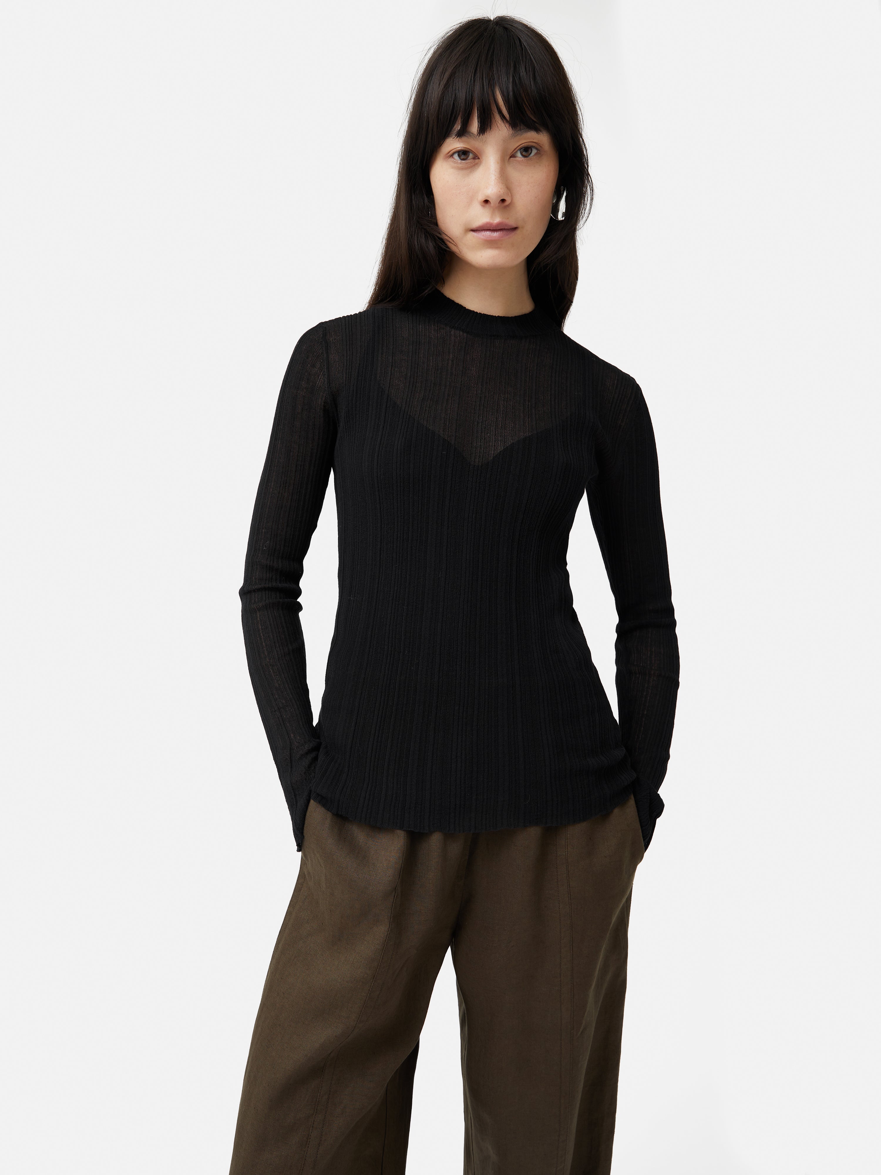 Trendy Black Plisse Crew Top for Women - Casual & Chic Irregular Hem Blouse for Everyday Wear, Office, and Date Nights