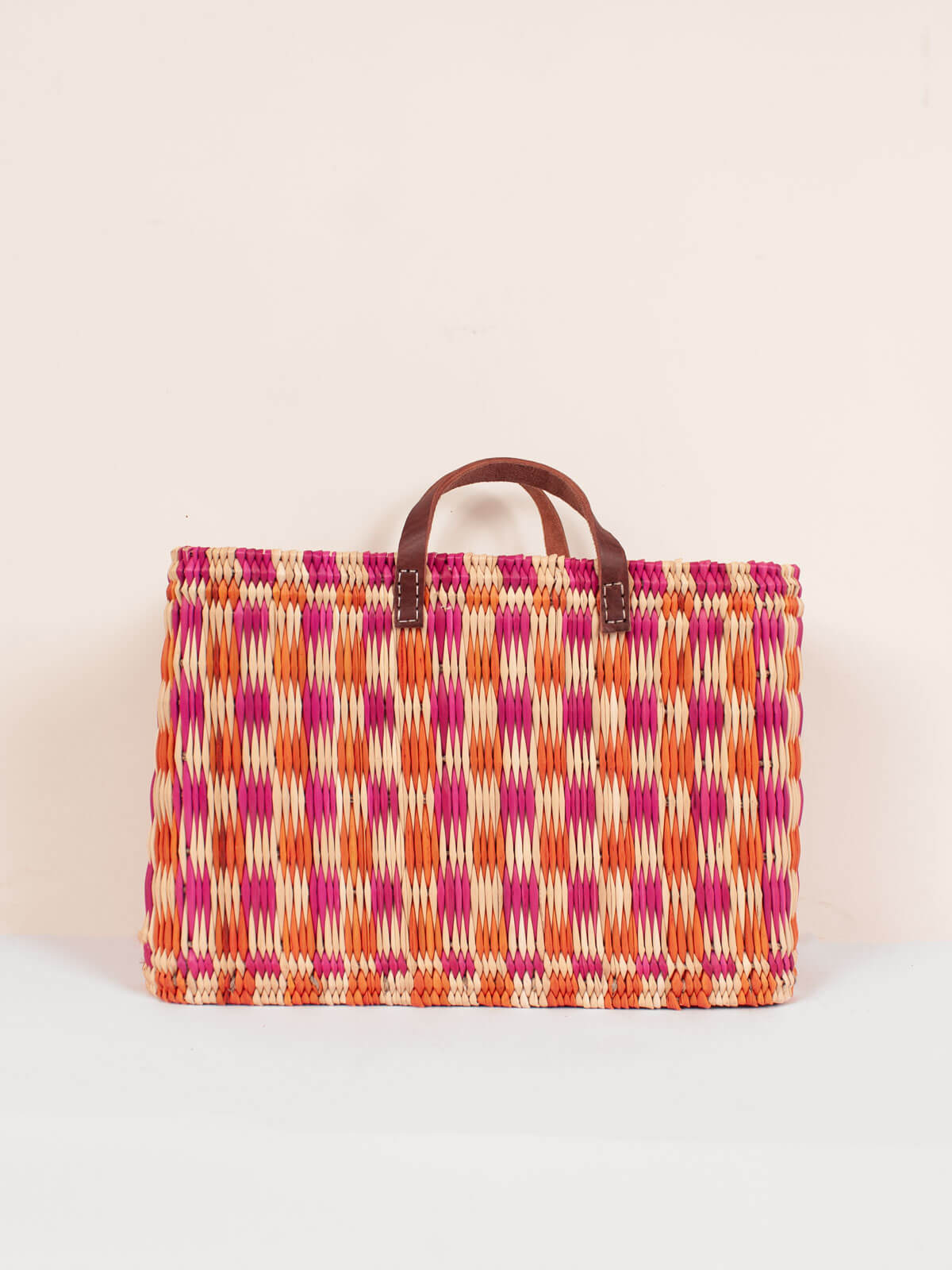 Stylish Pink and Orange Chequered Reed Basket - Perfect for Home Decor, Picnics, and Storage | Handwoven Natural Fiber Organizer for Living Room, Bedroom, or Outdoor Use