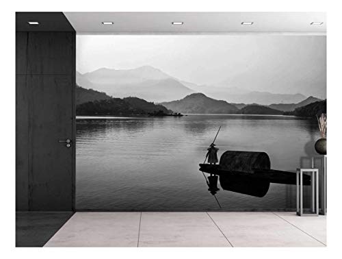 Black and White Canoe With a Man