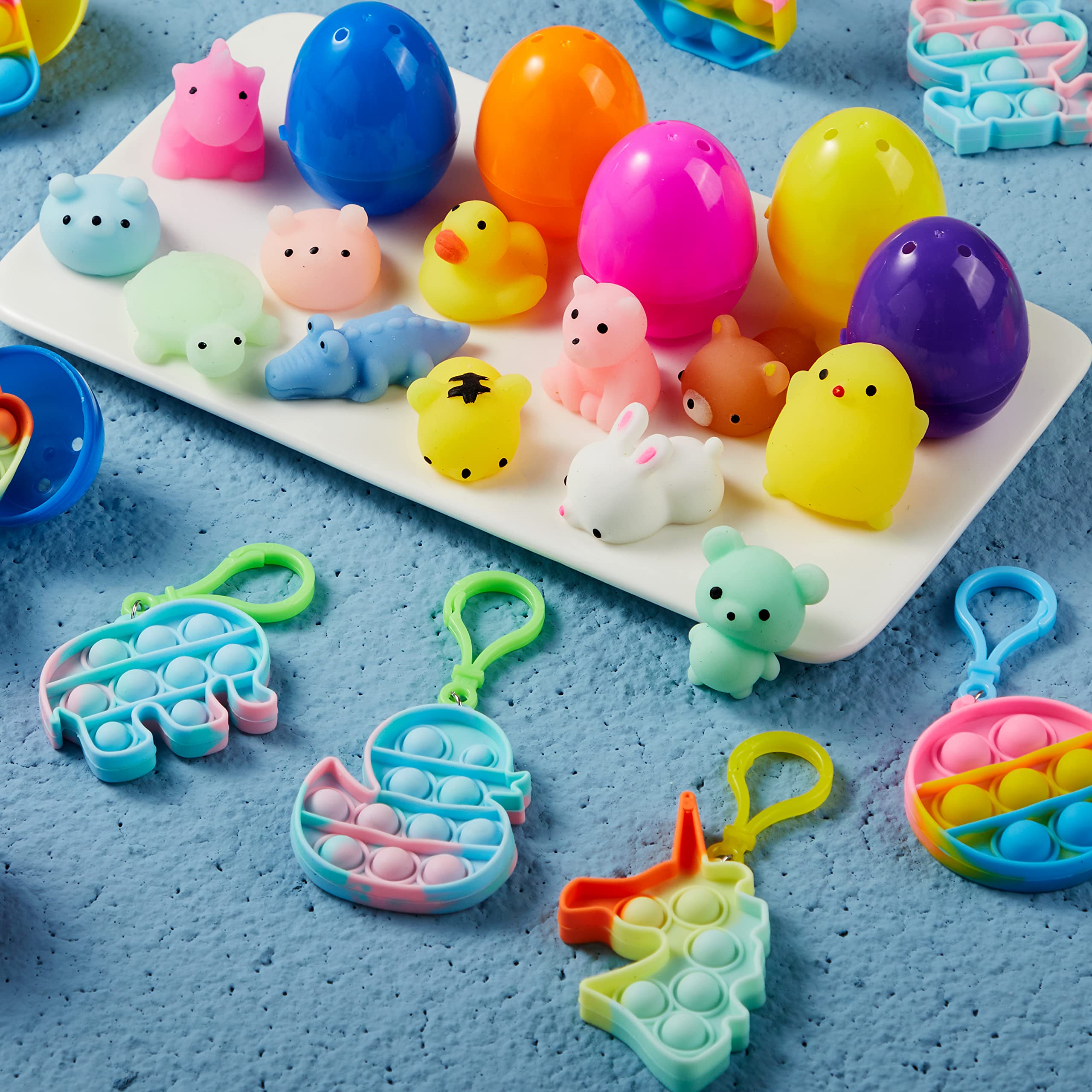 JOYIN 24-Piece Prefilled Easter Eggs with Assorted Toys - Includes Mochi Squishy Toys & Pop Bubble Fidget Keychains - Stress Relief Toys for Kids & Adults - Perfect for Easter Basket Stuffers, Party Favors, Easter Egg Hunt & Sensory Play