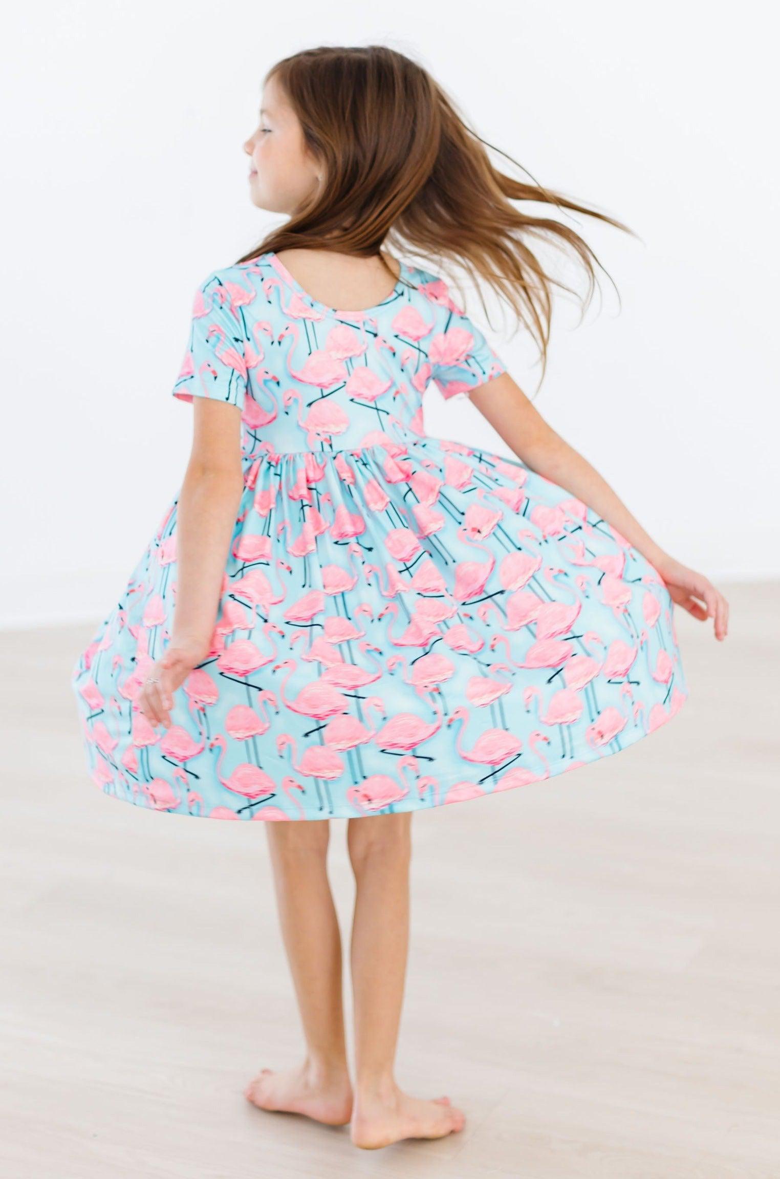 Stylish Pink Flamingo Short Sleeve Pocket Twirl Dress for Women - Perfect for Summer Parties, Beach Vacations & Casual Outings
