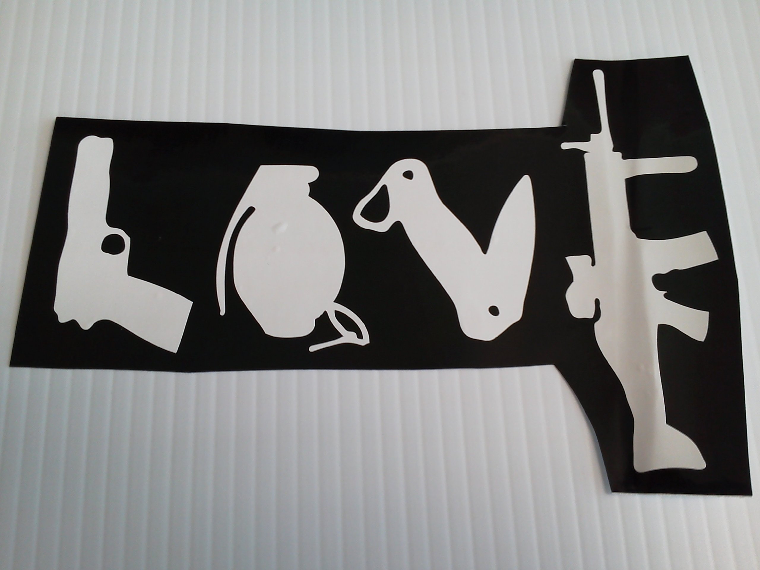 Love Gun Sticker - Decorative Vinyl Decal for Laptops, Cars, and DIY Projects - Perfect for Music Lovers and Rock Fans