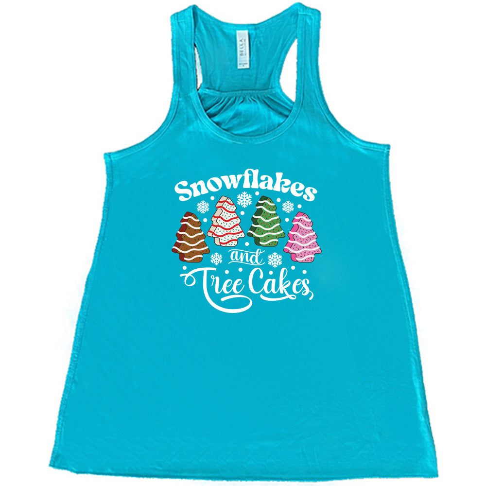 Snowflakes & Tree Cakes Graphic T-Shirt | Christmas Holiday Sweets Themed Cotton Tee for Women & Men | Perfect for Winter Parties, Gift Exchanges & Festive Celebrations