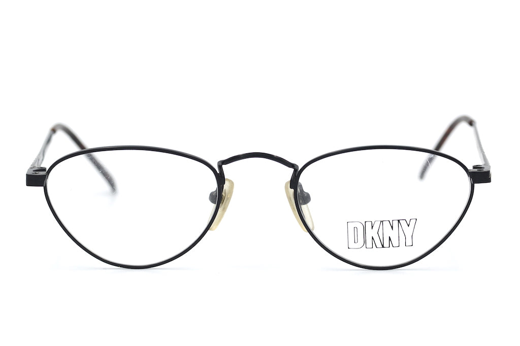 DKNY 334 Black Sunglasses for Women - Polarized UV Protection - Fashionable & Comfortable for Driving, Beach, and Outdoor Activities