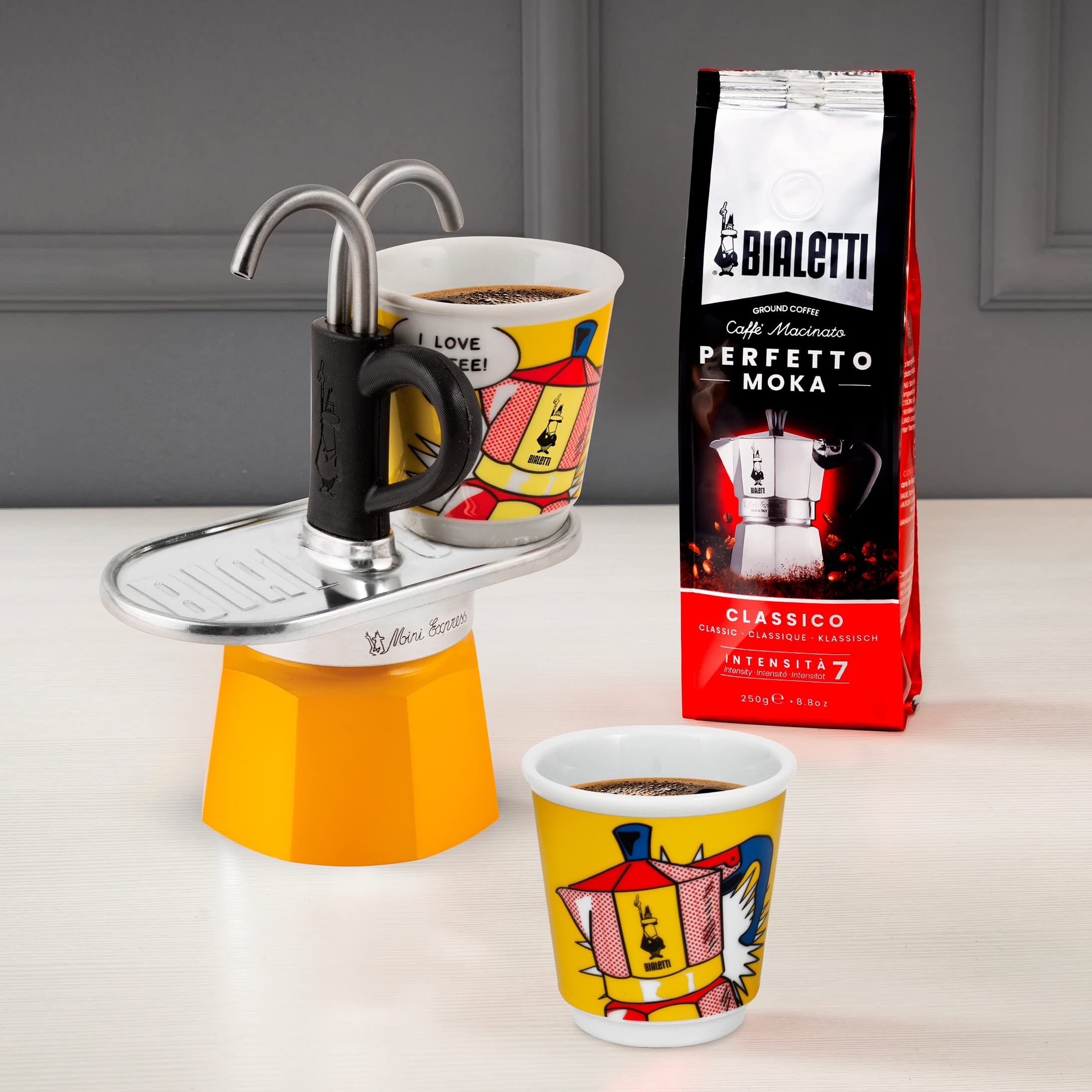 Bialetti Mini Express Moka Pot 2-Cup (2.8 Oz) Aluminum Stovetop Espresso Maker with 2 Shot Glasses - Yellow - Perfect for Home, Office & Camping Coffee Brewing