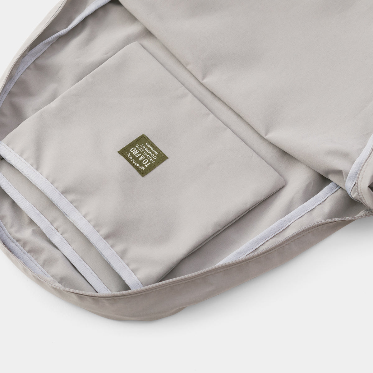 TRAVELER'S COMPANY x TO&FRO Premium Greige Backpack for Travel & Commuting | Durable Travel Bag for Work, School & Outdoor Adventures