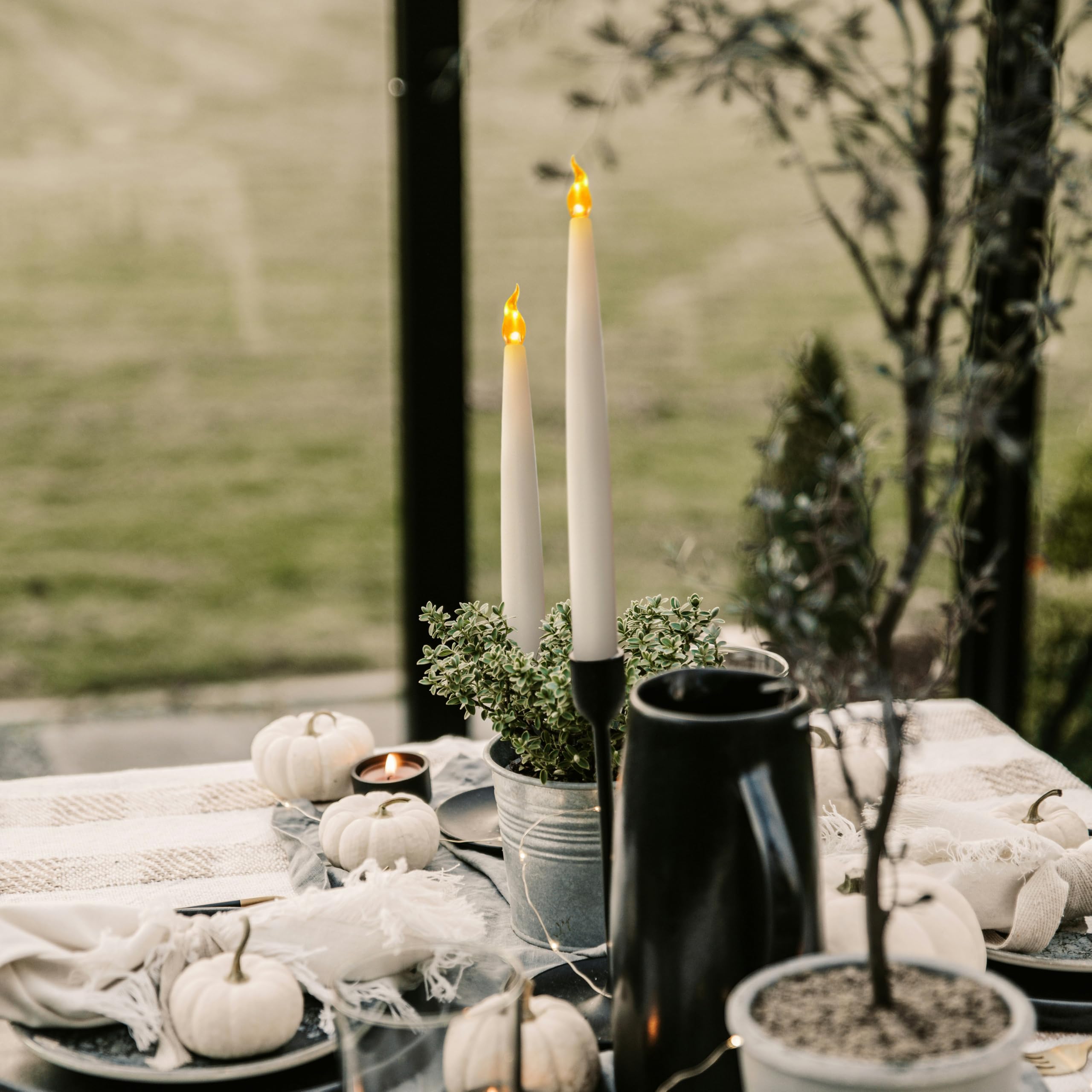FURORA LIGHTING White LED Taper Candles - Pack of 4 Flameless Battery Operated Candles with Realistic Flickering Flame, 6/18 Hour Timer, 11.5 Inches Tall - Perfect for Wedding Centerpieces, Dining Table Decor, and Romantic Ambiance