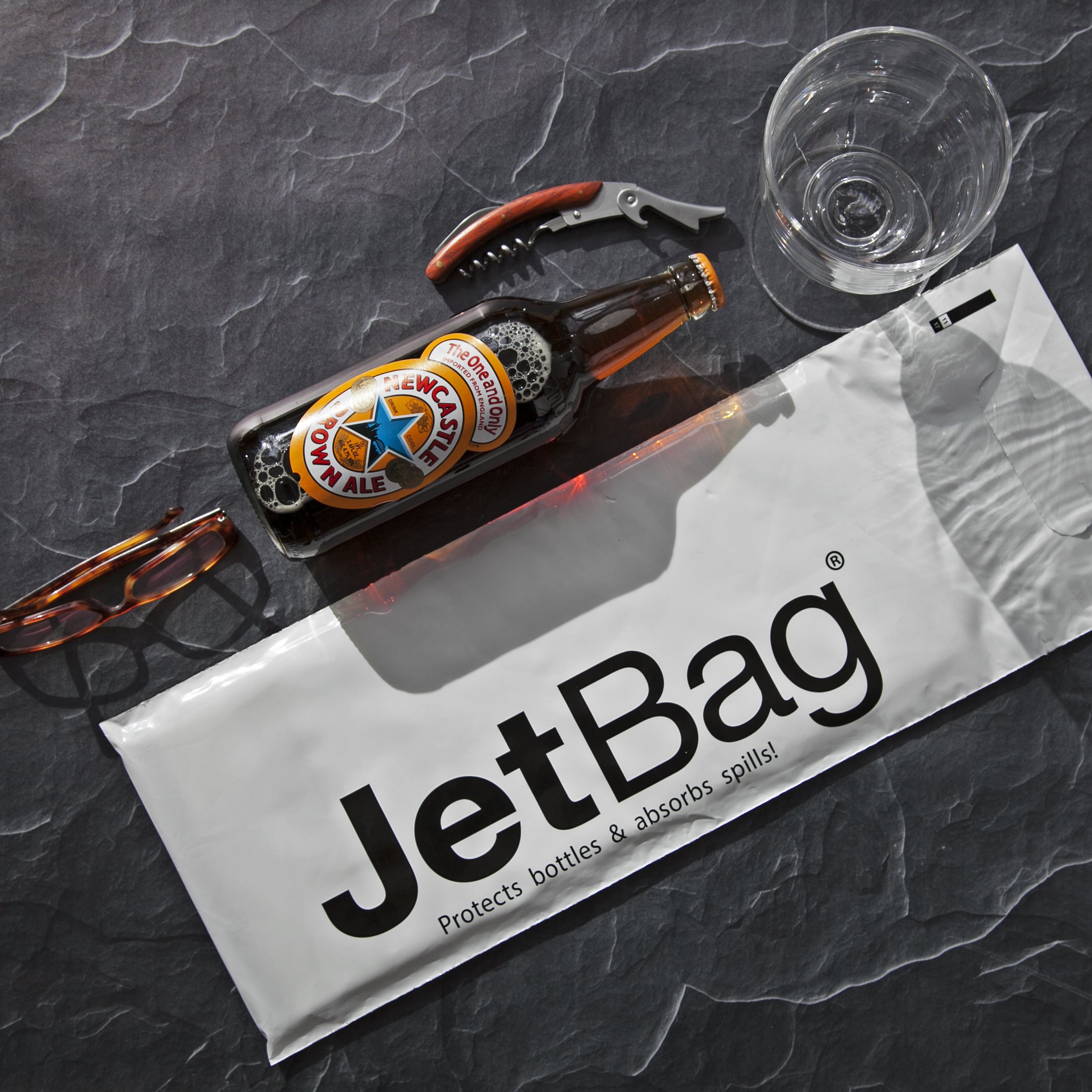 Jet Bag Bold - Original Absorbent Reusable Protective Bottle Bags (Case of 24) - Made in USA - Perfect for Spill Protection in Cars, Offices & Gyms