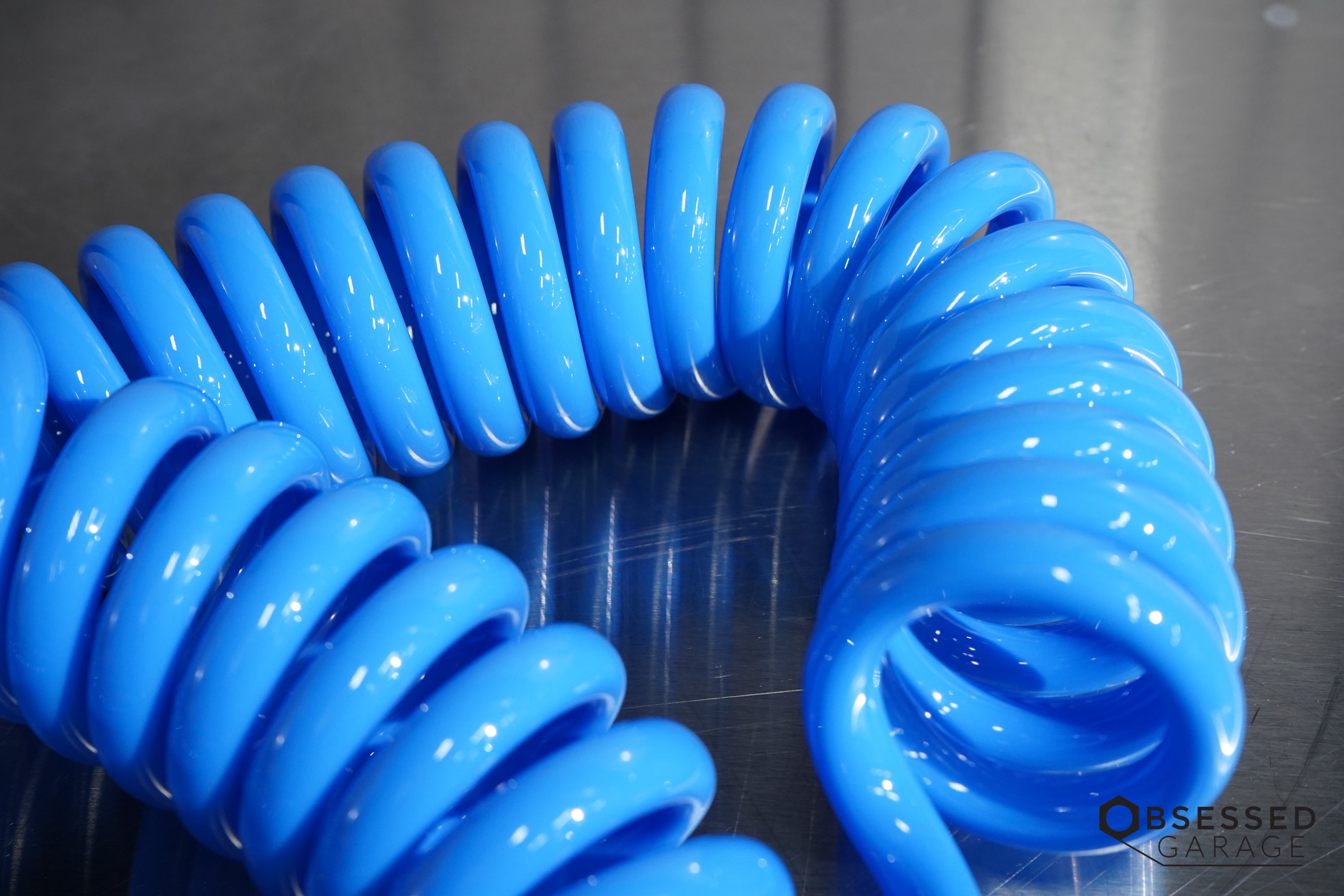 Prevost Spiral Hose with Fixed & Rotating 1/4