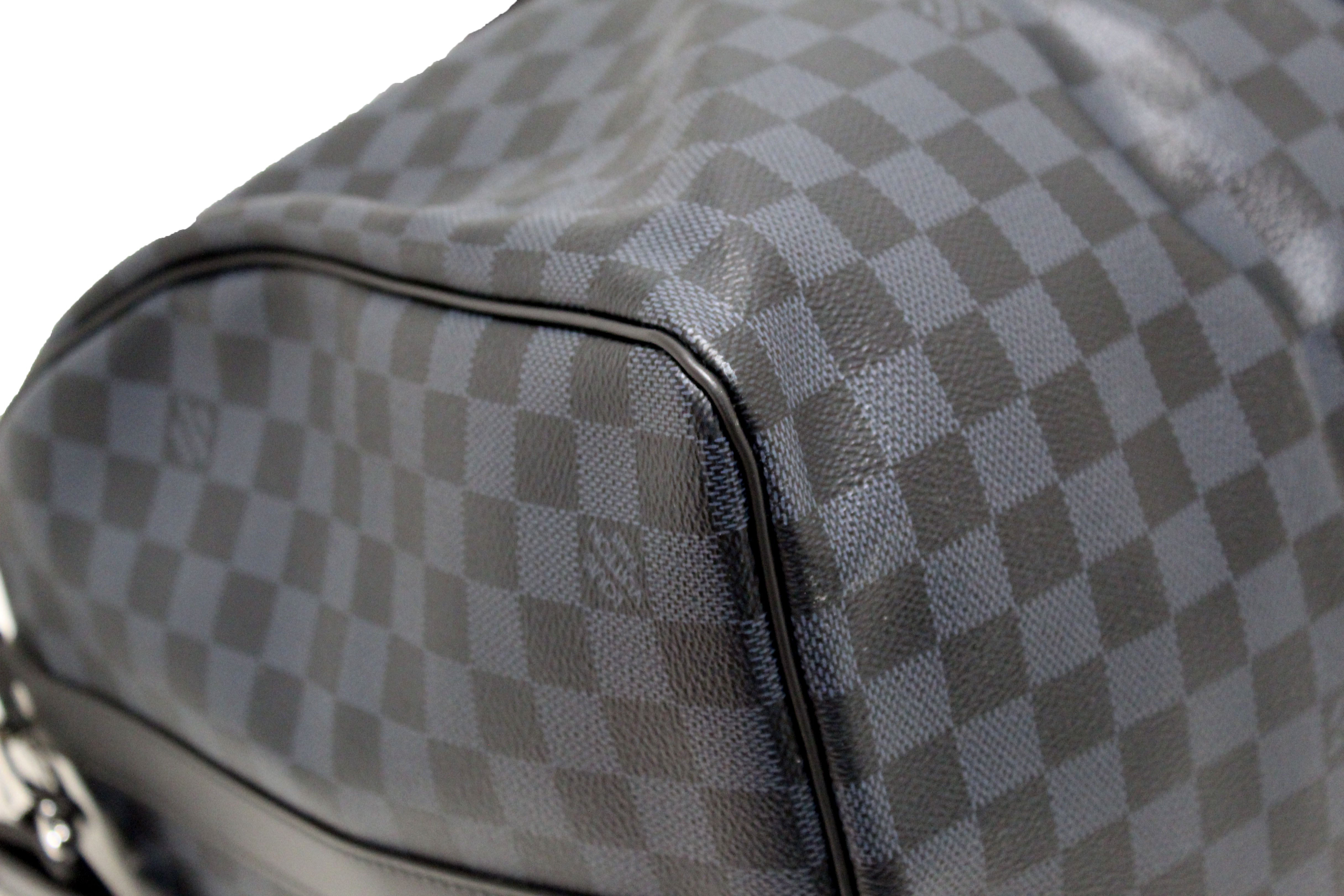 Authentic Louis Vuitton Damier Graphite Blue Coba Keepall Bandoulière 55 Travel Duffle Bag - Stylish Carry-On Luggage for Business Trips & Weekend Getaways
