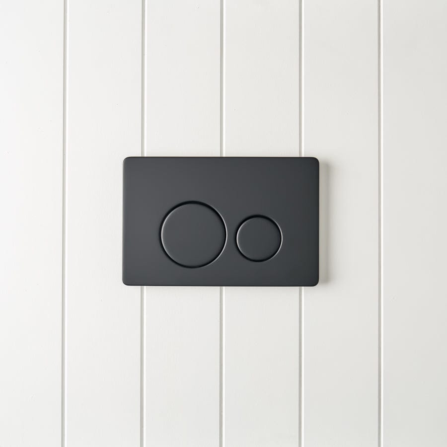 Angled In-Wall Toilet with Round Matte Black Buttons - Modern Space-Saving Bathroom Solution for Small Spaces & Contemporary Homes