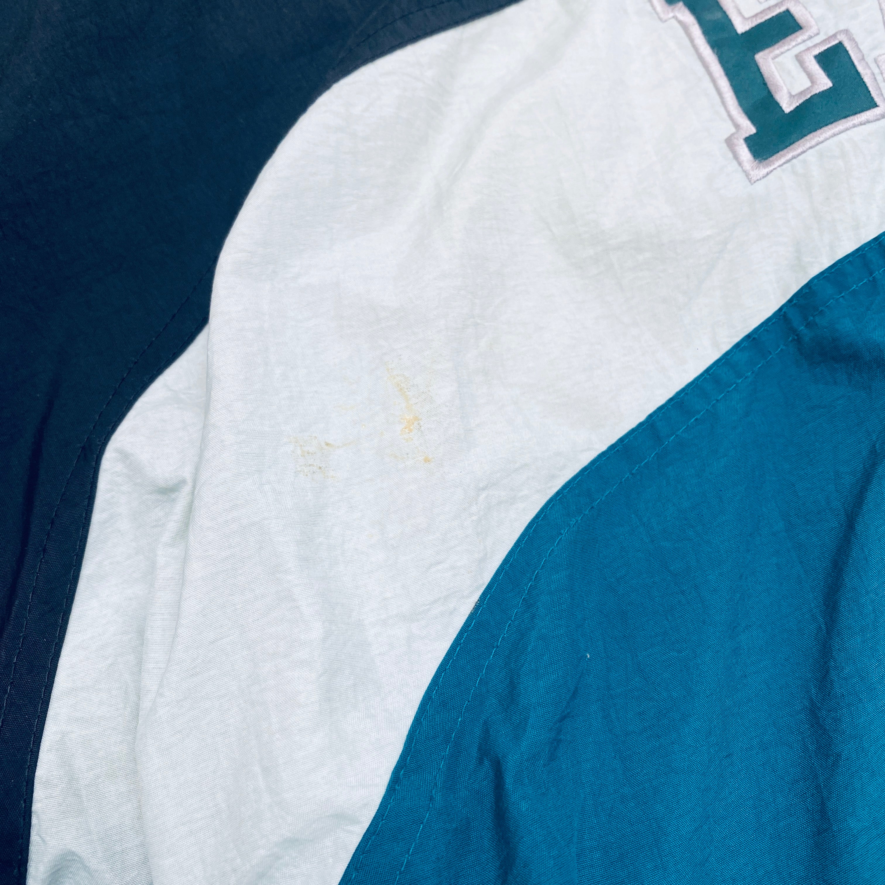 Philadelphia Eagles 1990s Reebok Reverse Spellout Full-Zip Proline Jacket for Men - Vintage NFL Football Fan Gear for Game Day & Casual Wear