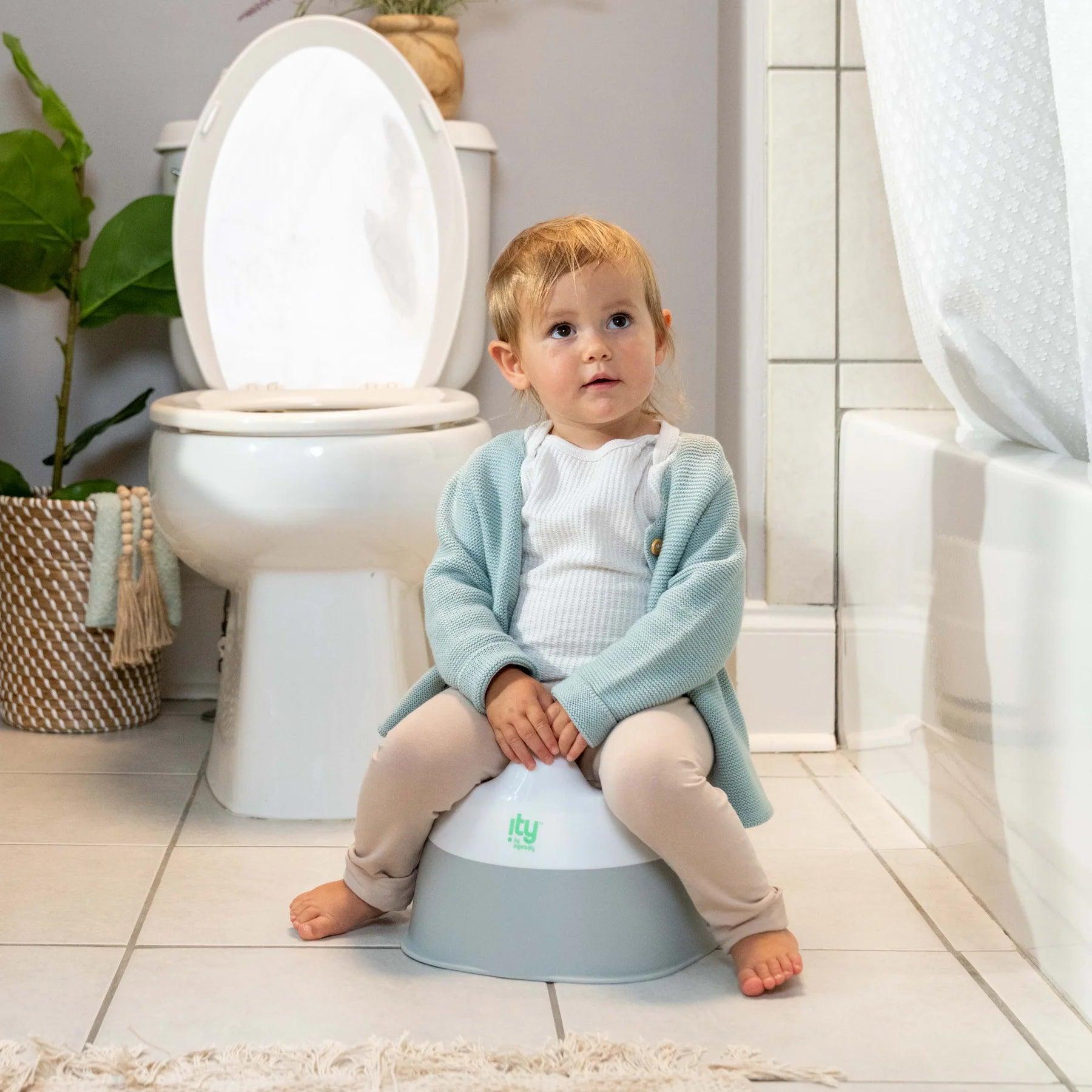 Ingenuity Ready Set Go Potty Training Seat for Babies & Toddlers - Easy-to-Clean, Comfortable & Portable Potty Chair for Boys & Girls - Perfect for Home, Travel & Daycare Use