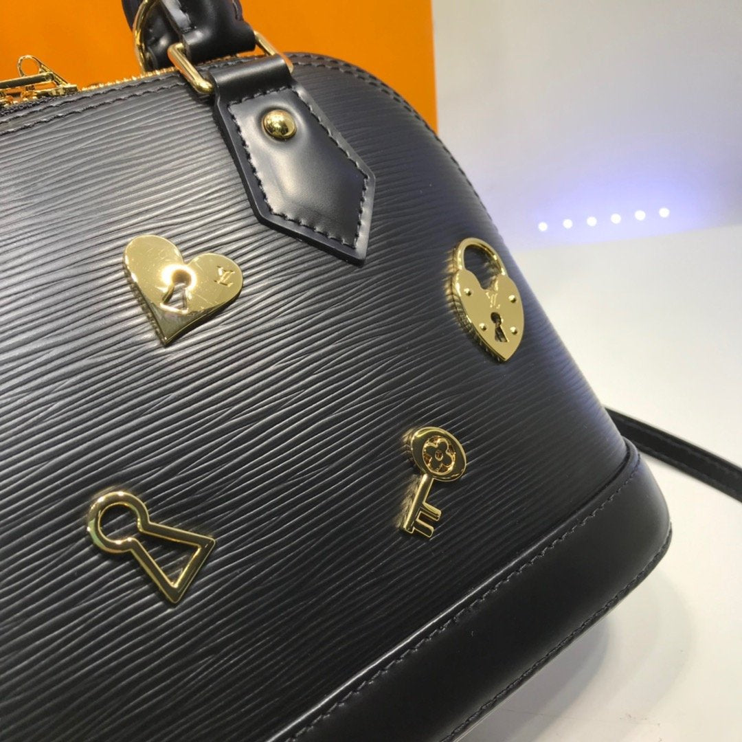 LV Alma BB Epi Leather Love Lock Edition Black Crossbody Bag - Luxury Designer Handbag for Women, Perfect for Date Night & Special Occasions