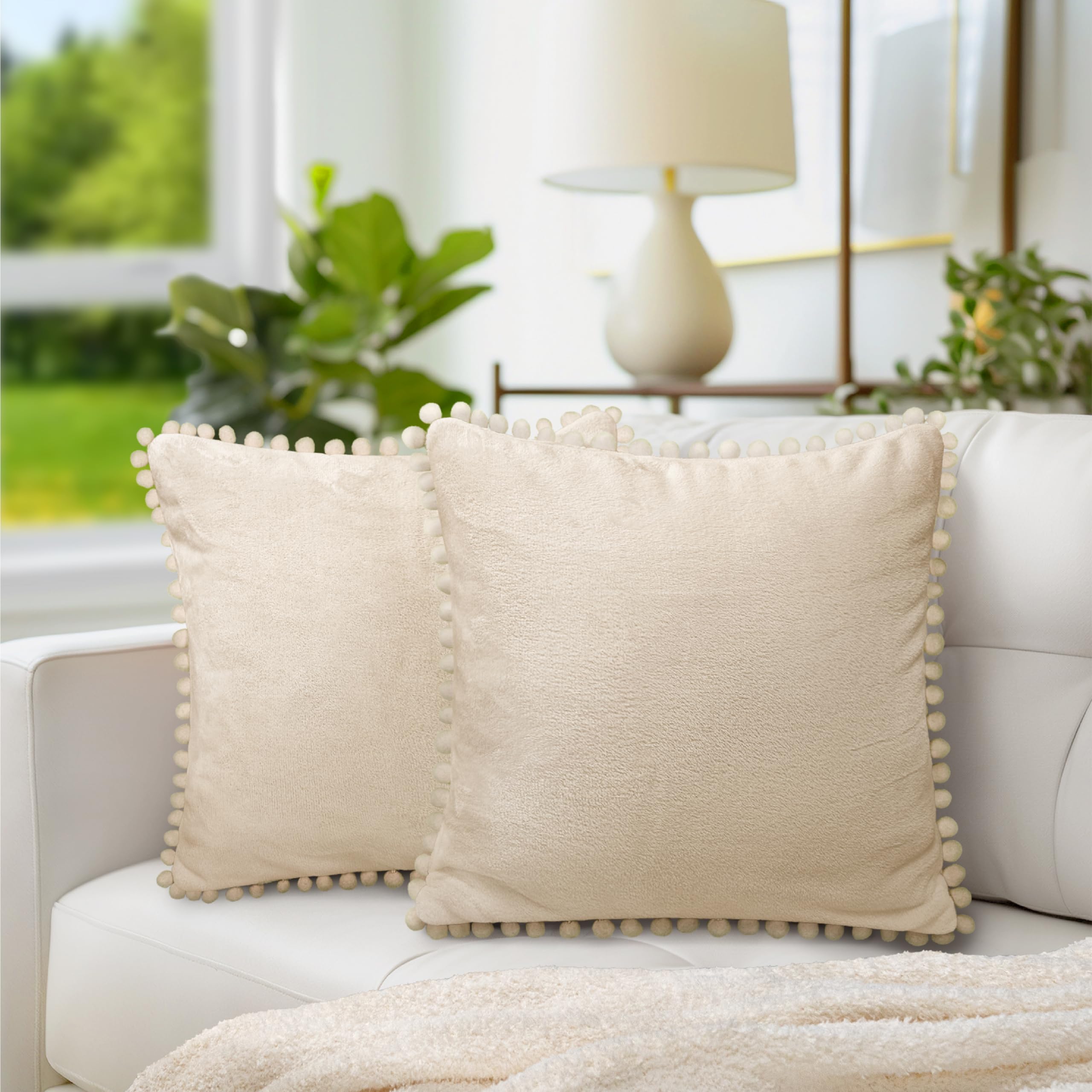 PAVILIA 18x18 Inch Cream Beige Velvet Throw Pillow Covers Set of 2 - Soft Plush Euro Square Decorative Cushion Cases with Pom Pom Trim for Sofa, Couch, Bed & Living Room - Cozy Home Decor & Aesthetic Bedroom Accent
