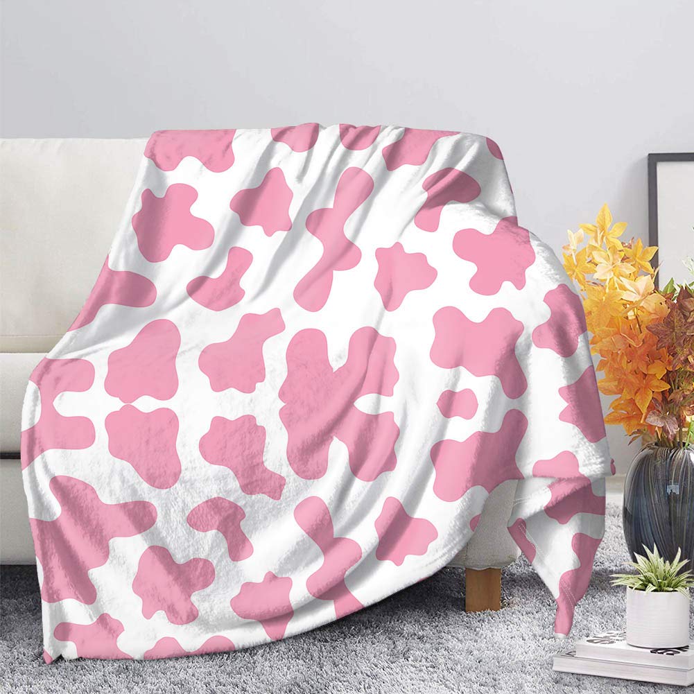 INSTANTARTS Cow Print Fleece Throw Blanket - Soft Cozy Flannel Blanket for Couch, Sofa & Bed - Lightweight Luxury Blanket for Women & Girls - All Season Comfort in White & Pink - Perfect for Home Decor, Movie Nights & Gift Giving
