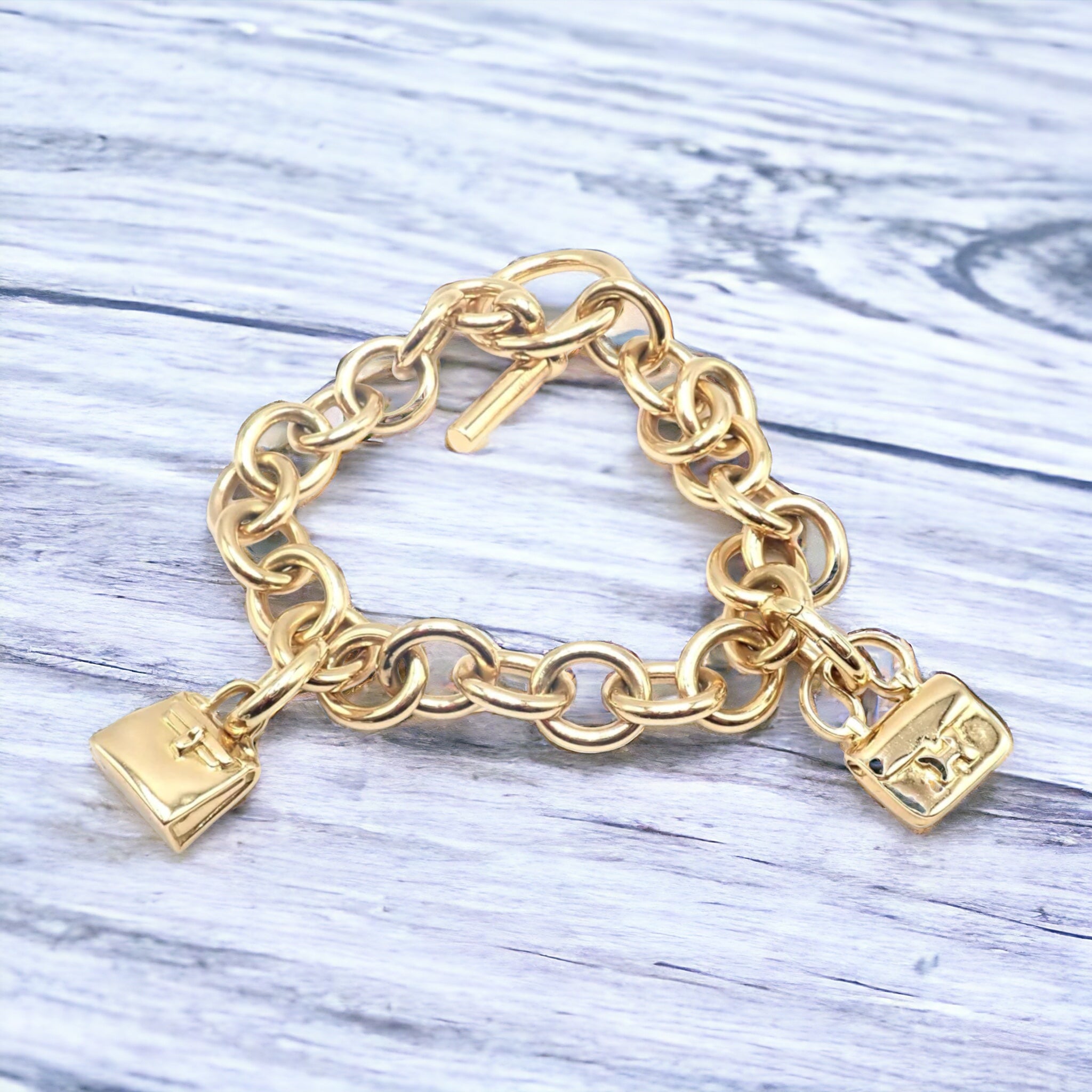 Authentic Hermes 18k Yellow Gold Heavy Link Toggle Bracelet with Two Charms - Luxury Jewelry for Women, Perfect for Gifts, Parties & Special Occasions