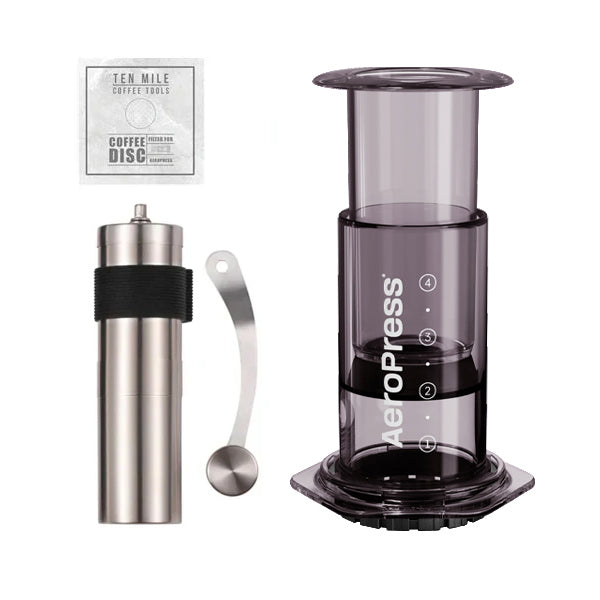 AeroPress Clear Coffee Maker Starter Kit - Portable Espresso & Coffee Press for Travel, Camping, Office & Home Brewing - Includes Filters & Scoop
