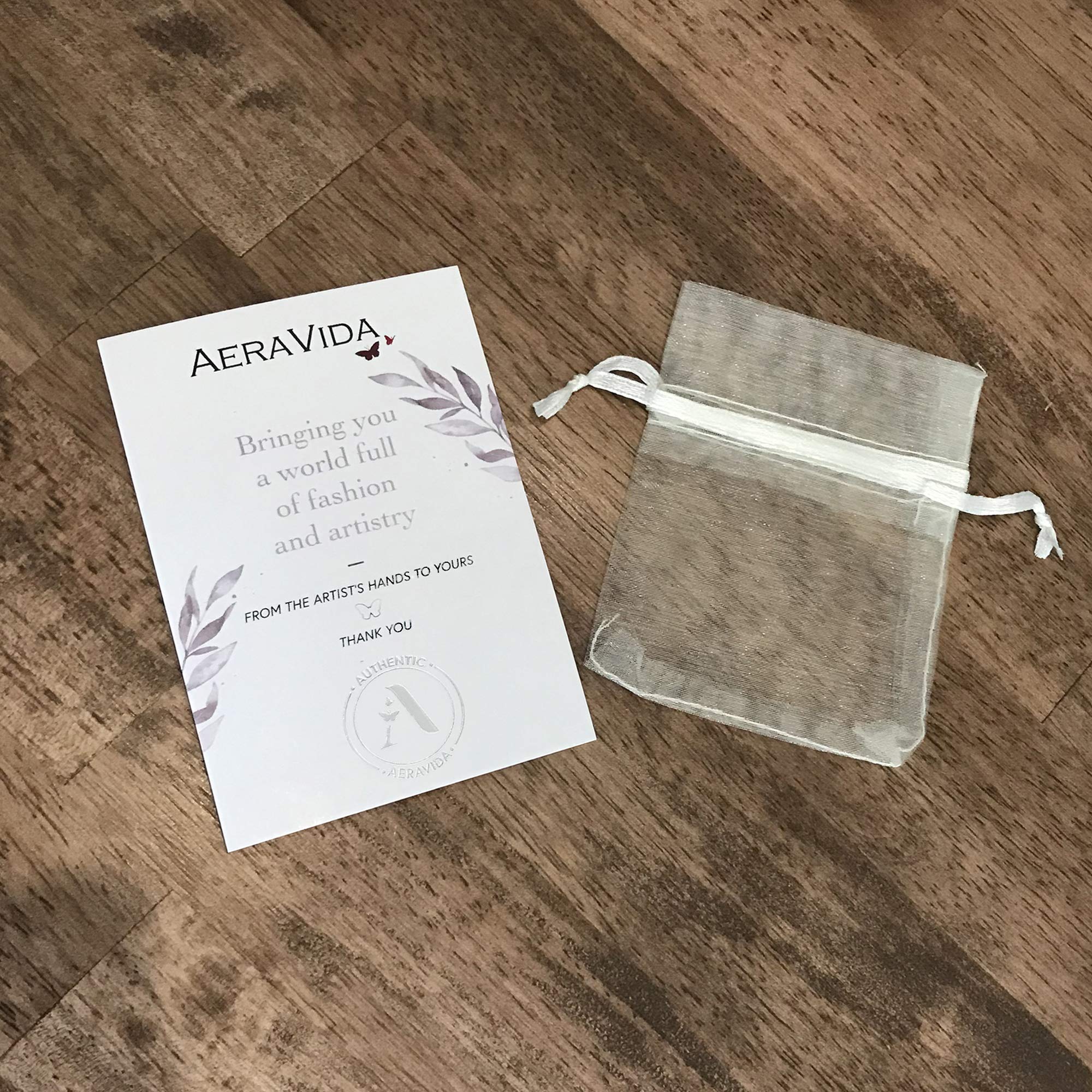 AeraVida Butterfly Rainbow Abalone Sterling Silver Ring for Women | .925 Silver Statement Ring | Elegant Wedding & Casual Jewelry | Comfort Fit Sizes 6-14 | Perfect Gift for Daughter, Wife, or Loved One | Ideal for Weddings, Anniversaries, Date Nights & Everyday Wear