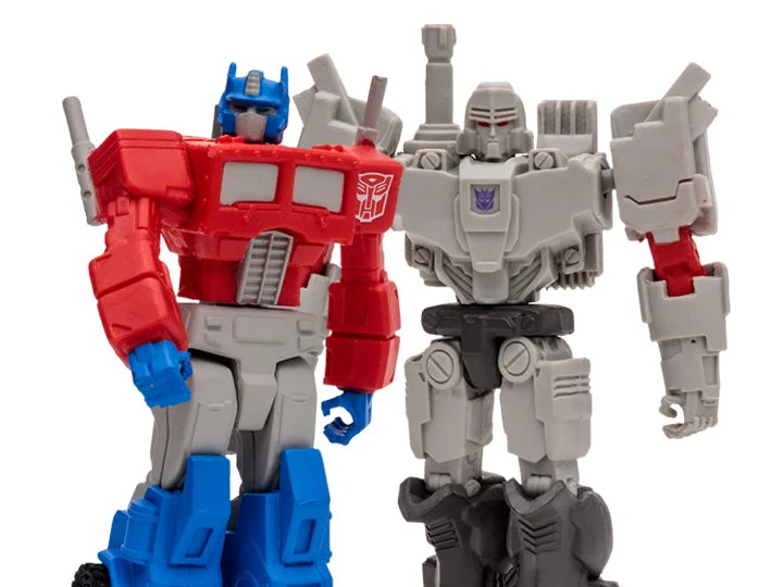 Transformers Page Punchers Action Figures 2-Pack - Optimus Prime & Megatron with Exclusive Comic Book | Collectible Robot Toys for Kids & Adults | Perfect for Display, Gifts, and Role-Playing Scenes