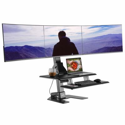 Elevate Your Workday: The Story of Alex and the AVLT Triple 32 Monitor Electric Standing Desk Converter