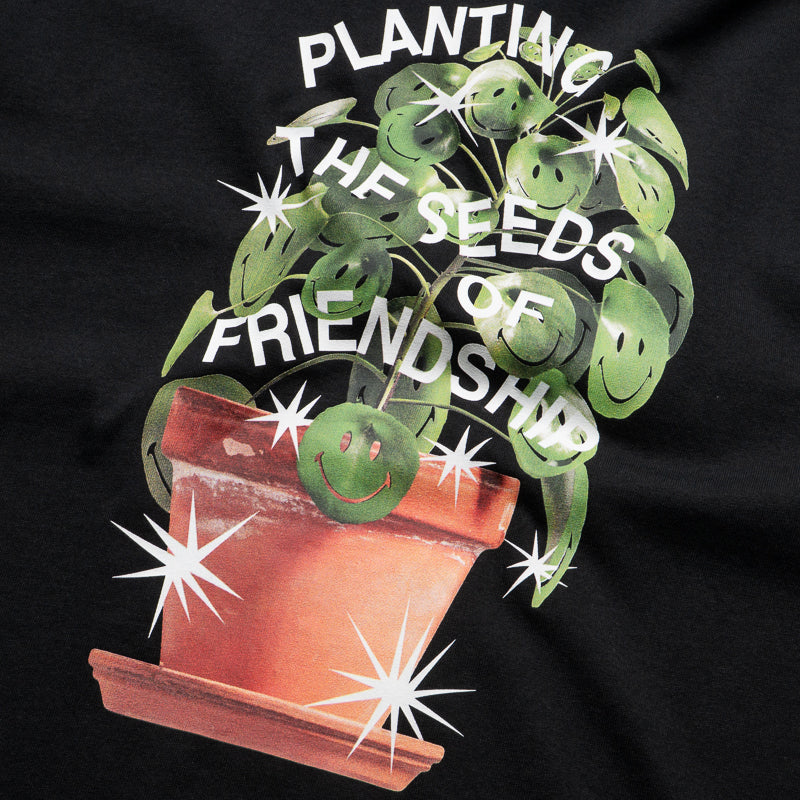Market Smiley Seeds of Friendship T-Shirt - Black | Trendy Graphic Tee for Casual Wear & Friendship Gifts
