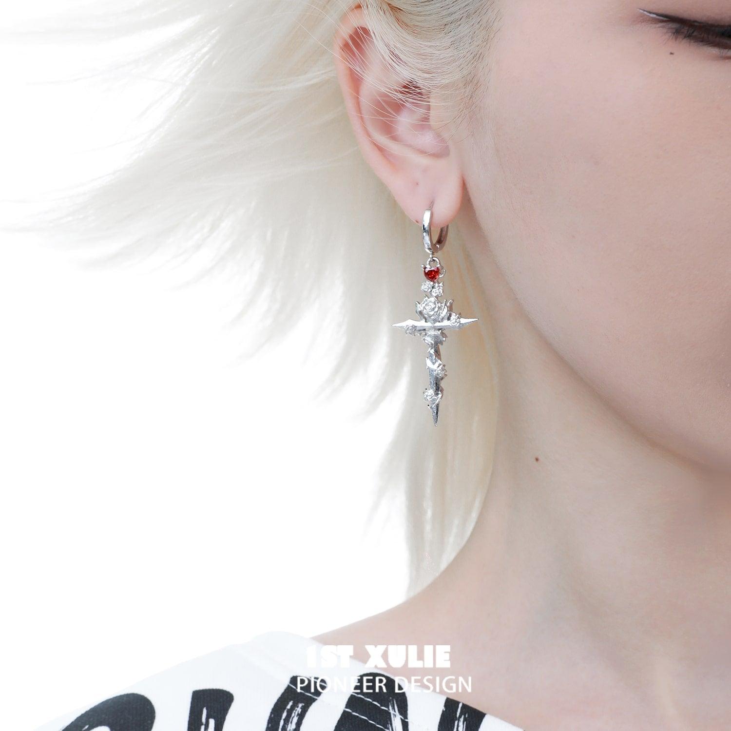 single silver earring