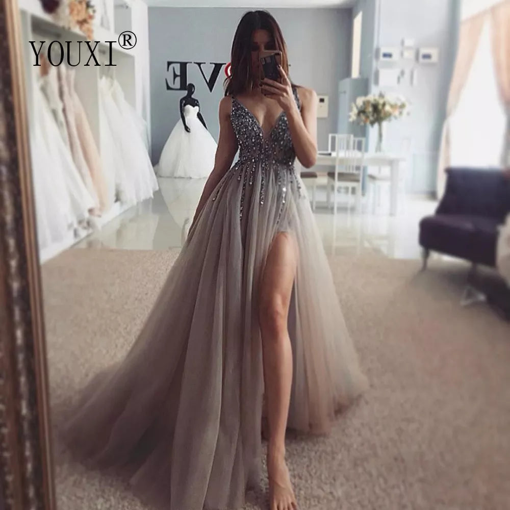 Elegant Light Gray Beaded Prom Dress with V-Neck, High Slit & Sweep Train - Sleeveless Backless A-Line Evening Gown for Homecoming, Formal Dances & Special Occasions